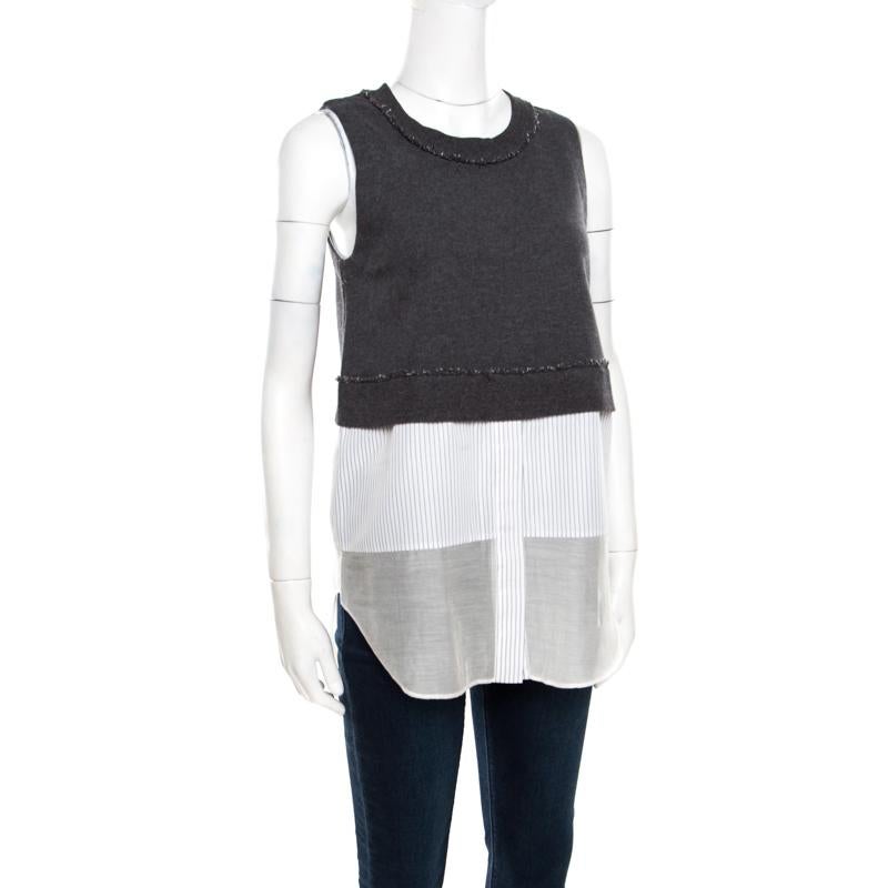 Style comes easy in this interestingly-designed blouse from 10 Crosby Derek Lam. It is crafted in a relaxed silhouette with a blend of fabrics into a layered style flaunting a combination of grey and white hues. Featuring a sleeveless style and a