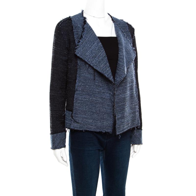 A classic jacket exuding navy blue and black hues is a piece that every modern-day fashionista must have. Coming from the house of Derek Lam, this jacket is every bit sophisticated and smart. The open front style and the textured finish make this it
