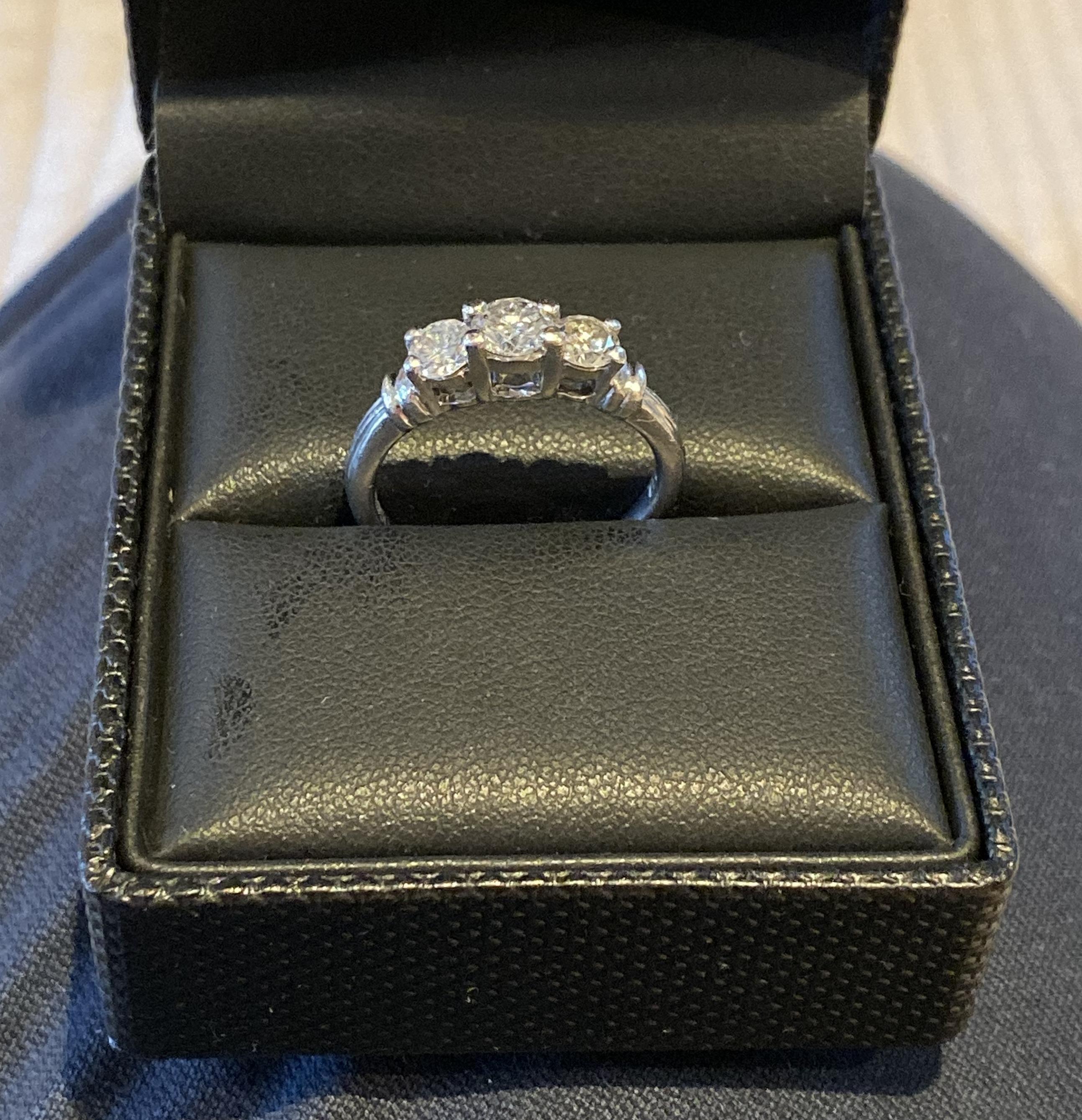 
Wimbledon-Furniture are delighted to offer for auction this Stunning Bradleys 3 stone 1.0ct diamond ring in a four claw platinum 950 setting

A very good looking ring with bright clear diamonds, this would be ideal as an engagement or eternity