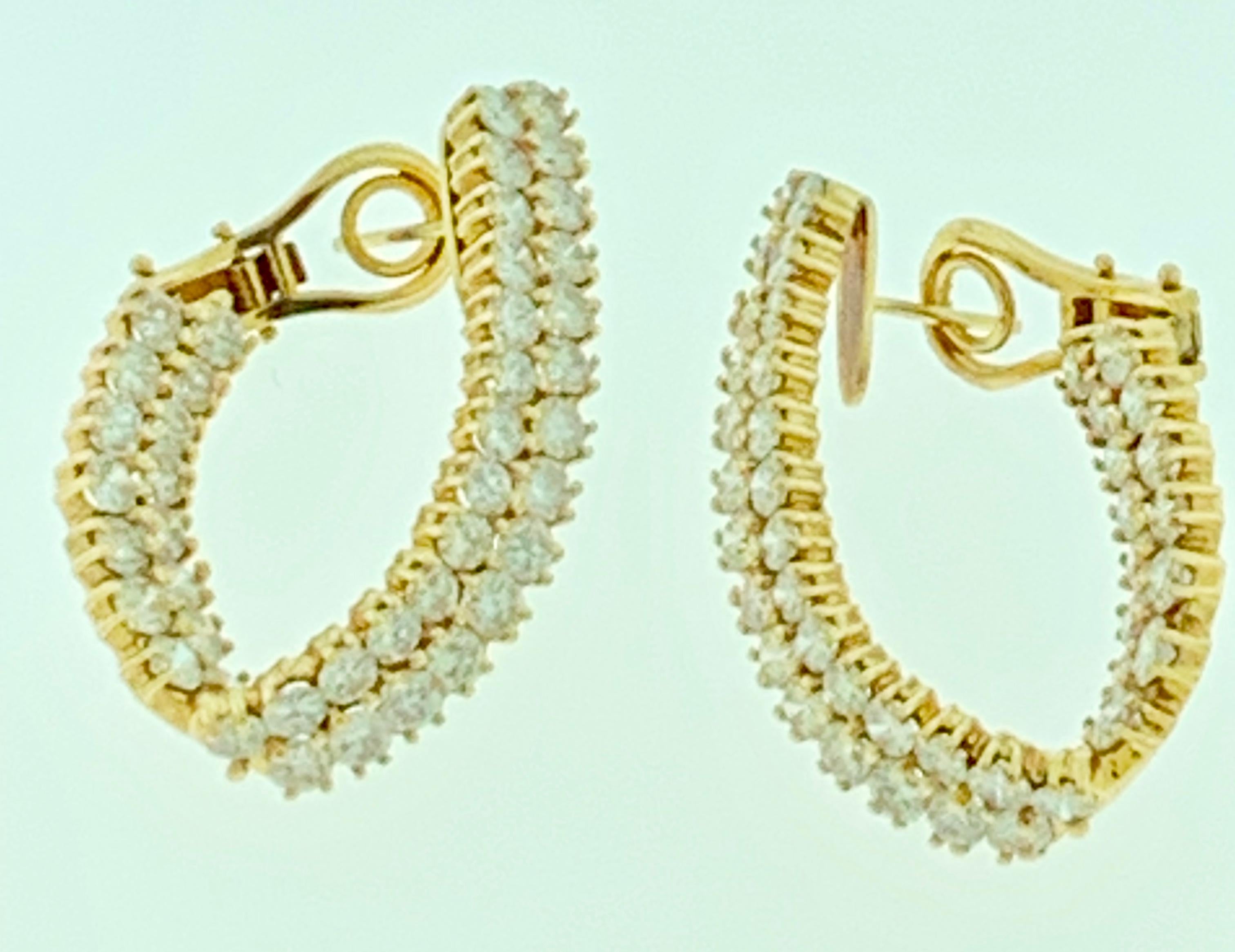 10 Ct Diamond VS Quality Hoop Earrings - Women In 18 kt Yellow gold 
Immaculately crafted from 18kt Yellow gold, these stunning Diamonds earrings are facing in front so you can see both front and back part of the e hoops 
It's a unique and playful