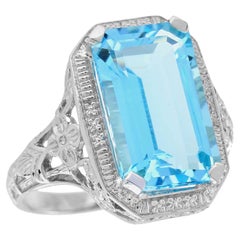 10 Ct. Bague cocktail de style vintage en or blanc massif 9 carats avec topaze bleue naturelle