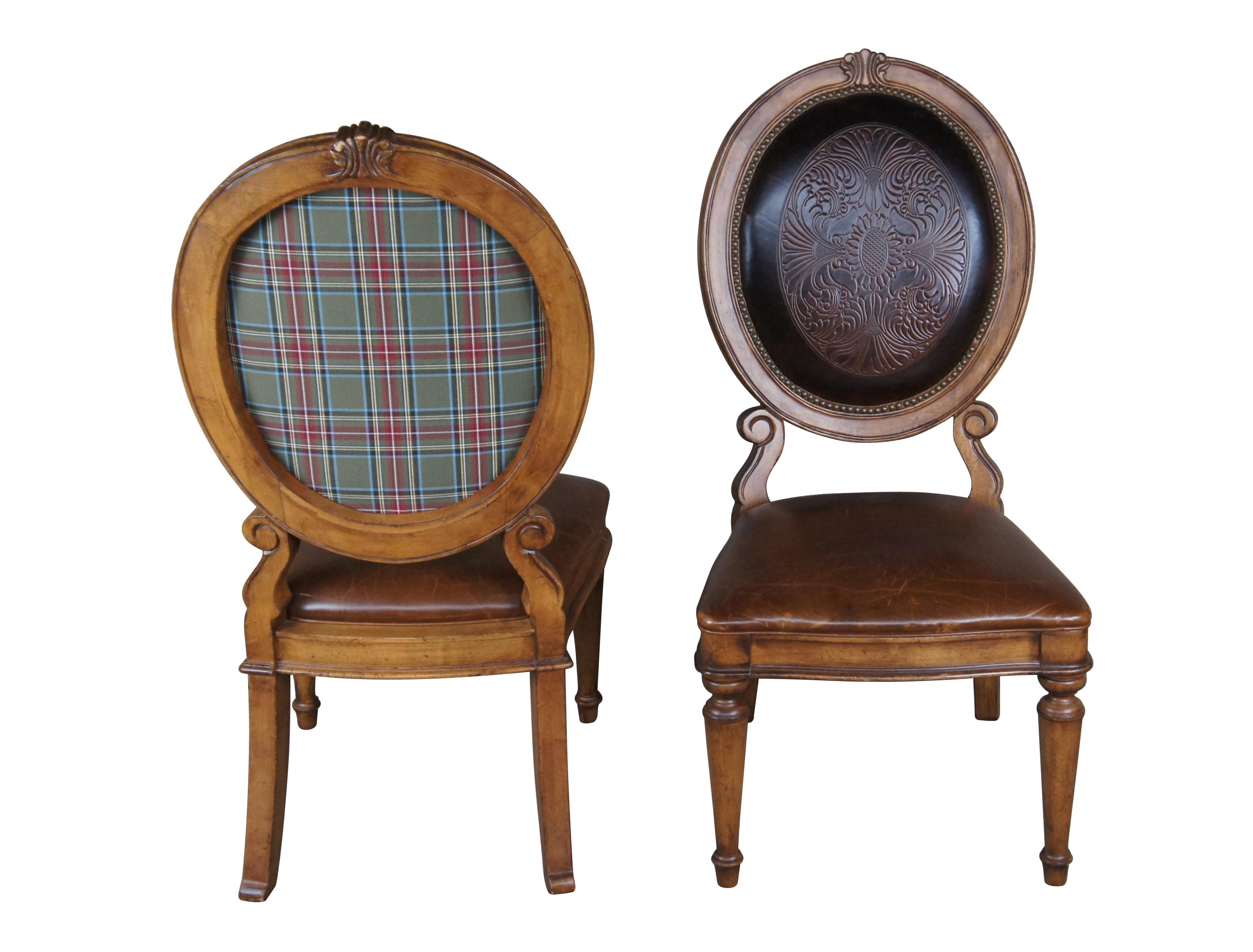 Vintage set of ten Tuscan Old World style oval back dining chairs.  Featuring tooled leather nailhead back with scrolled supports, leather seat, and plaid upholstered back.  The chairs are supported by turned and tapered front feet and spade feet