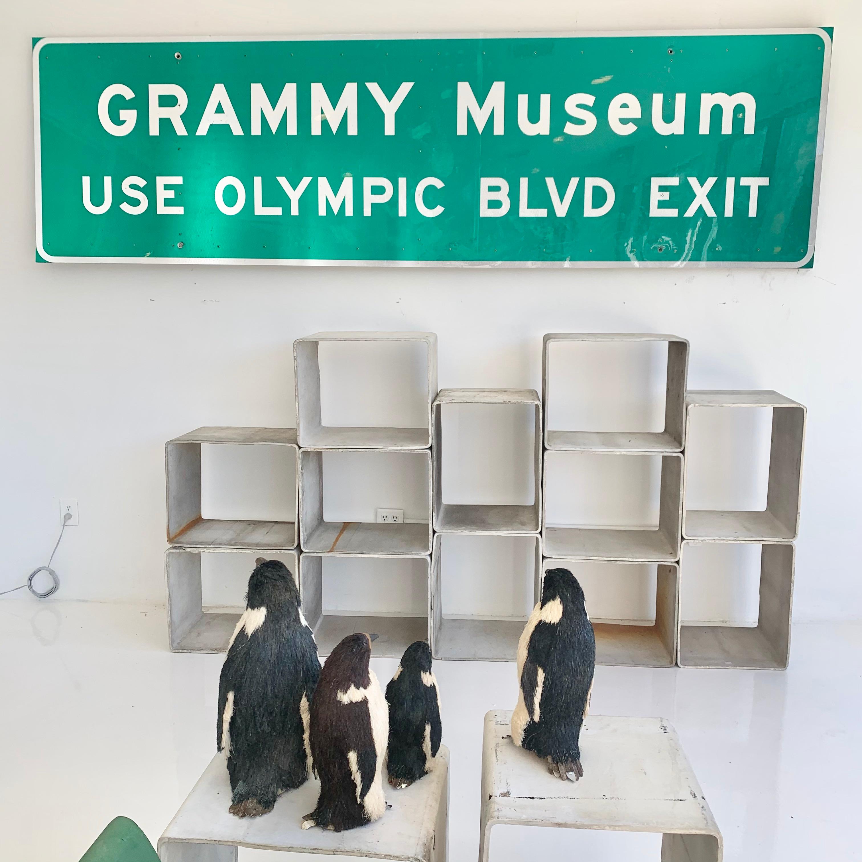 Super cool Los Angeles freeway sign. 10.5 feet long and 3 feet tall. Metal sign, likely from 10 Freeway. Sign depicts the exit ramp for the GRAMMY MUSEUM, founded in 2008 in Downtown Los Angeles. Green reflective background with white lettering.