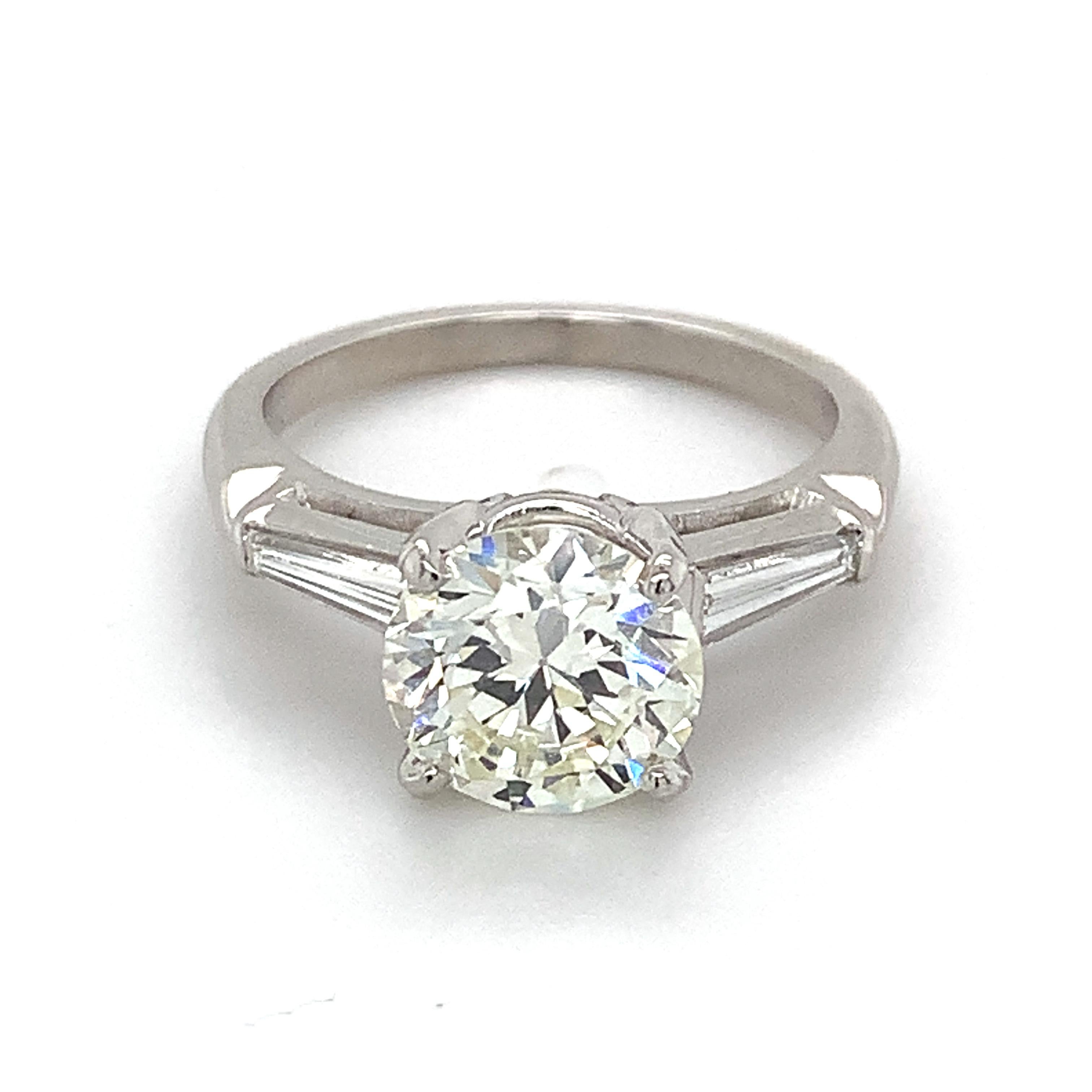 Round Cut 10% Irid 90% Plat GIA 2.12 L-VVS2 Round Diamond & Tapered Baguette 3 Stone Ring