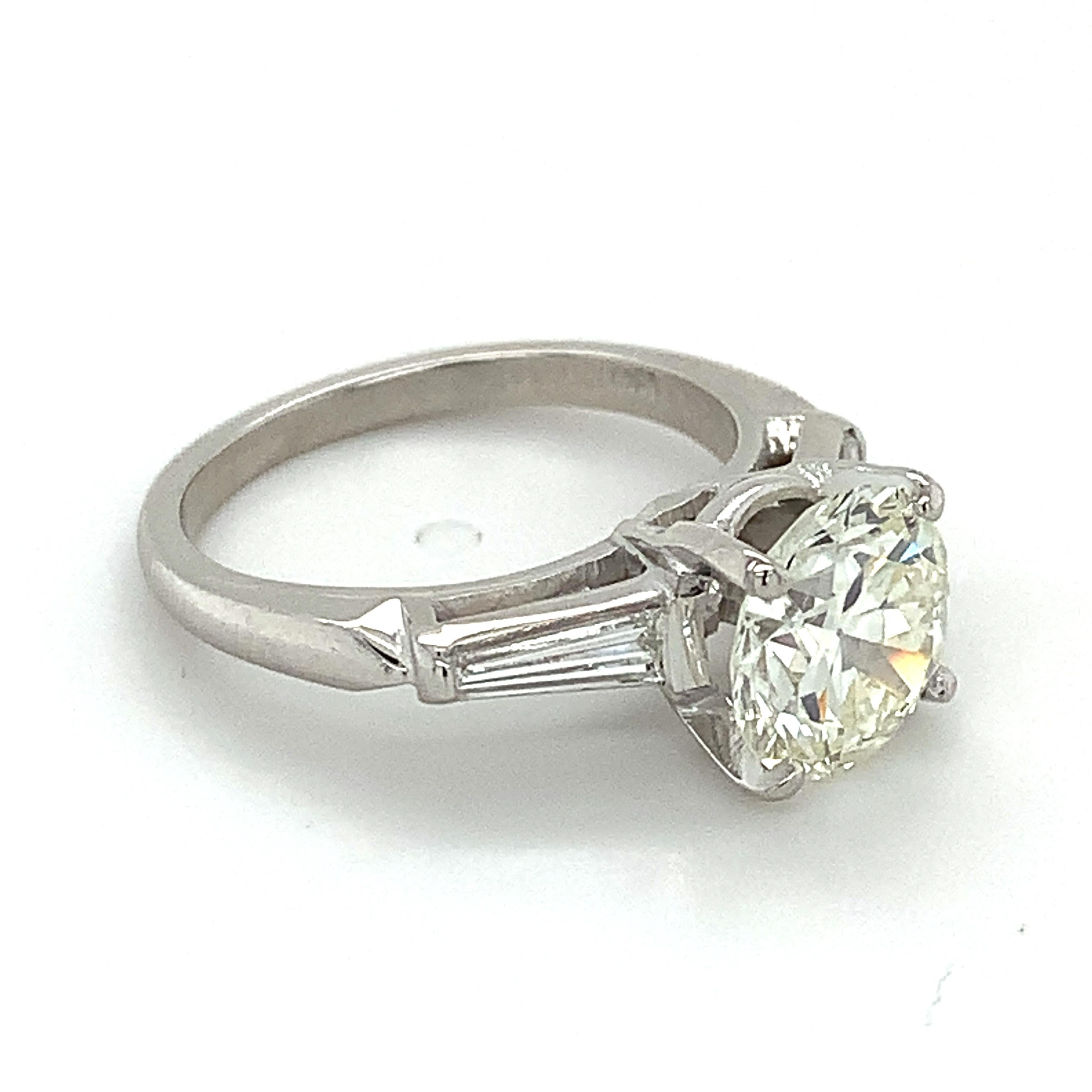 Women's 10% Irid 90% Plat GIA 2.12 L-VVS2 Round Diamond & Tapered Baguette 3 Stone Ring
