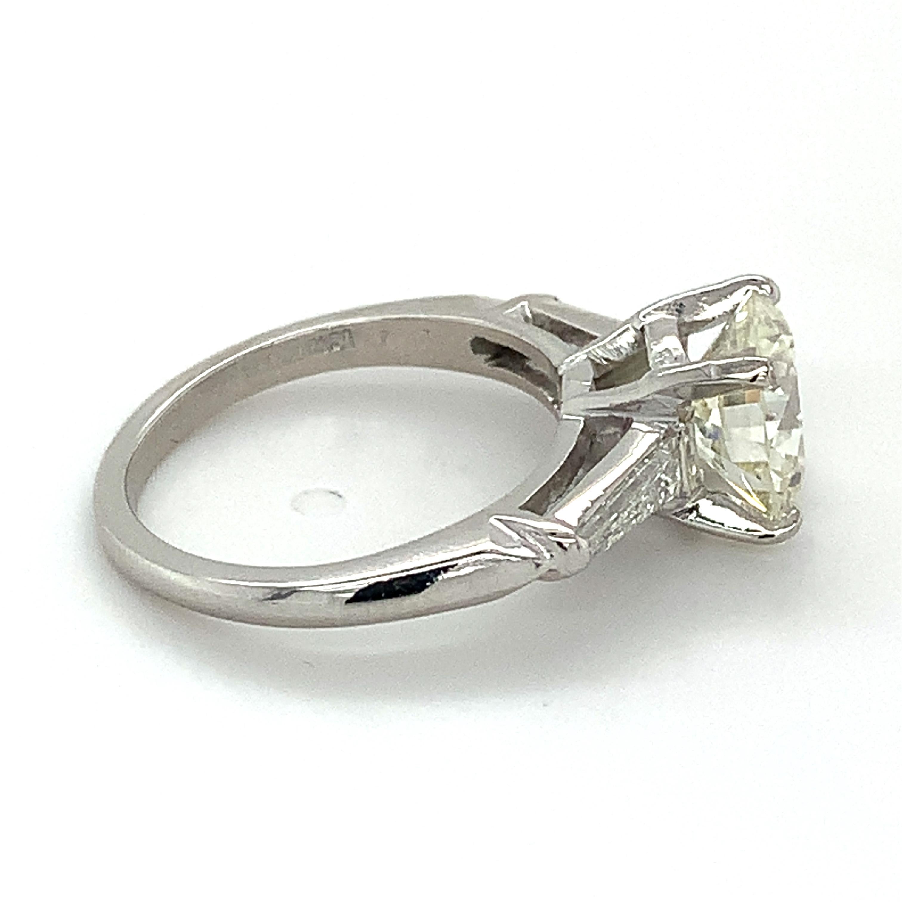 10% Irid 90% Plat GIA 2.12 L-VVS2 Round Diamond & Tapered Baguette 3 Stone Ring 1
