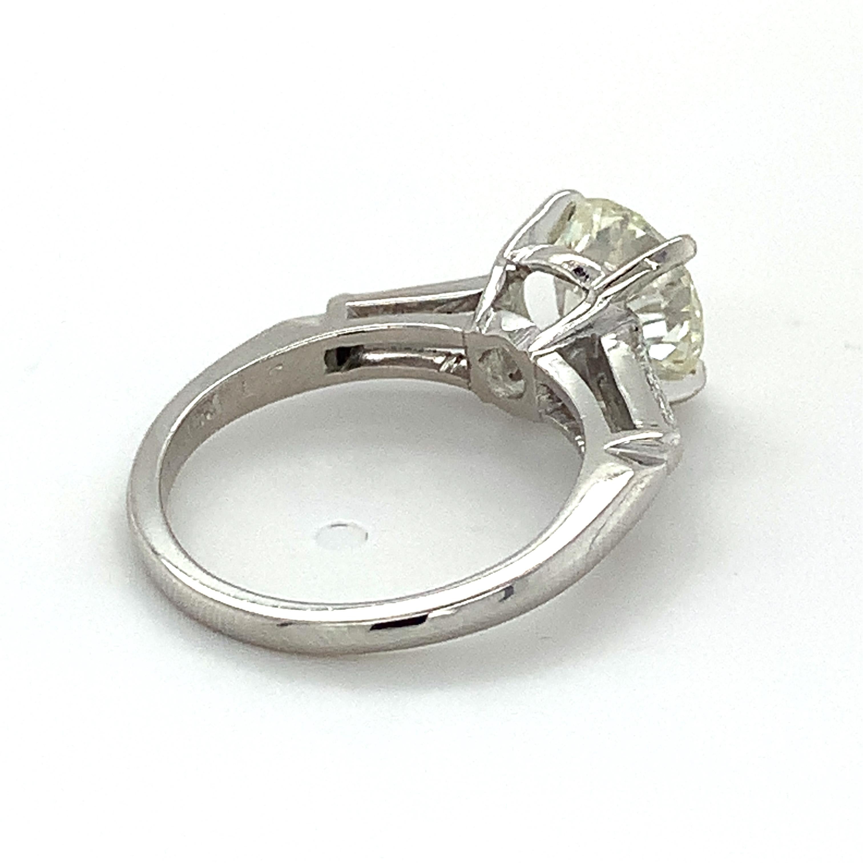 10% Irid 90% Plat GIA 2.12 L-VVS2 Round Diamond & Tapered Baguette 3 Stone Ring 2