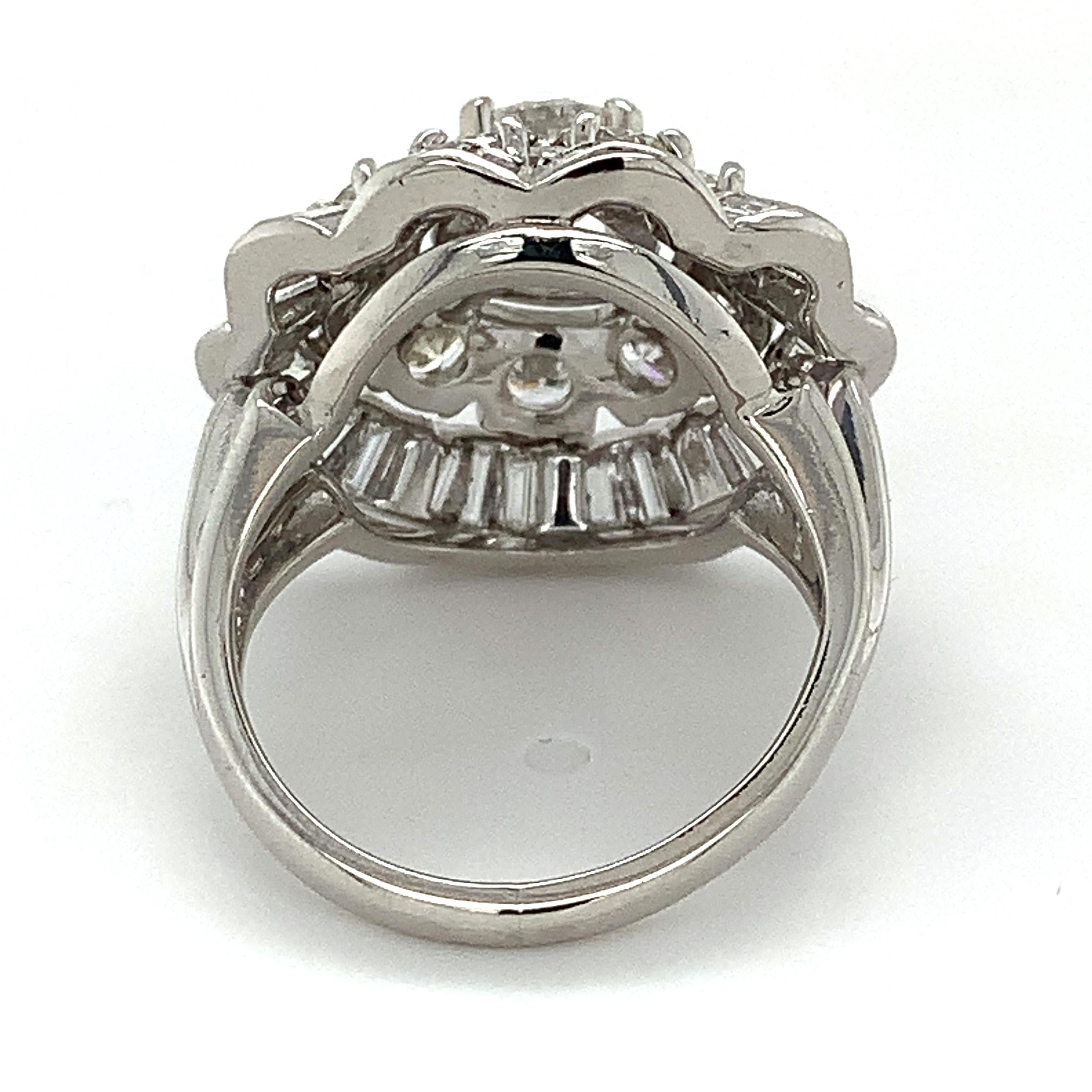 10 Irid 90 Plat Round Center And Ballerina Baguette And Round Diamond Halo Ring For Sale At