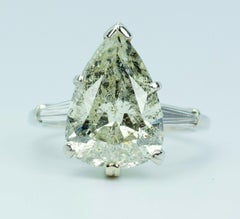 10% Irid 90% Platinum 6.65 Carat Pear Shape Diamond with Tapered Baguette Ring