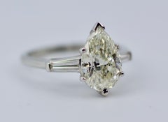 10% Iridium 90% Platinum 2 Carat Pear Shape Diamond with Tapered Baguette Ring