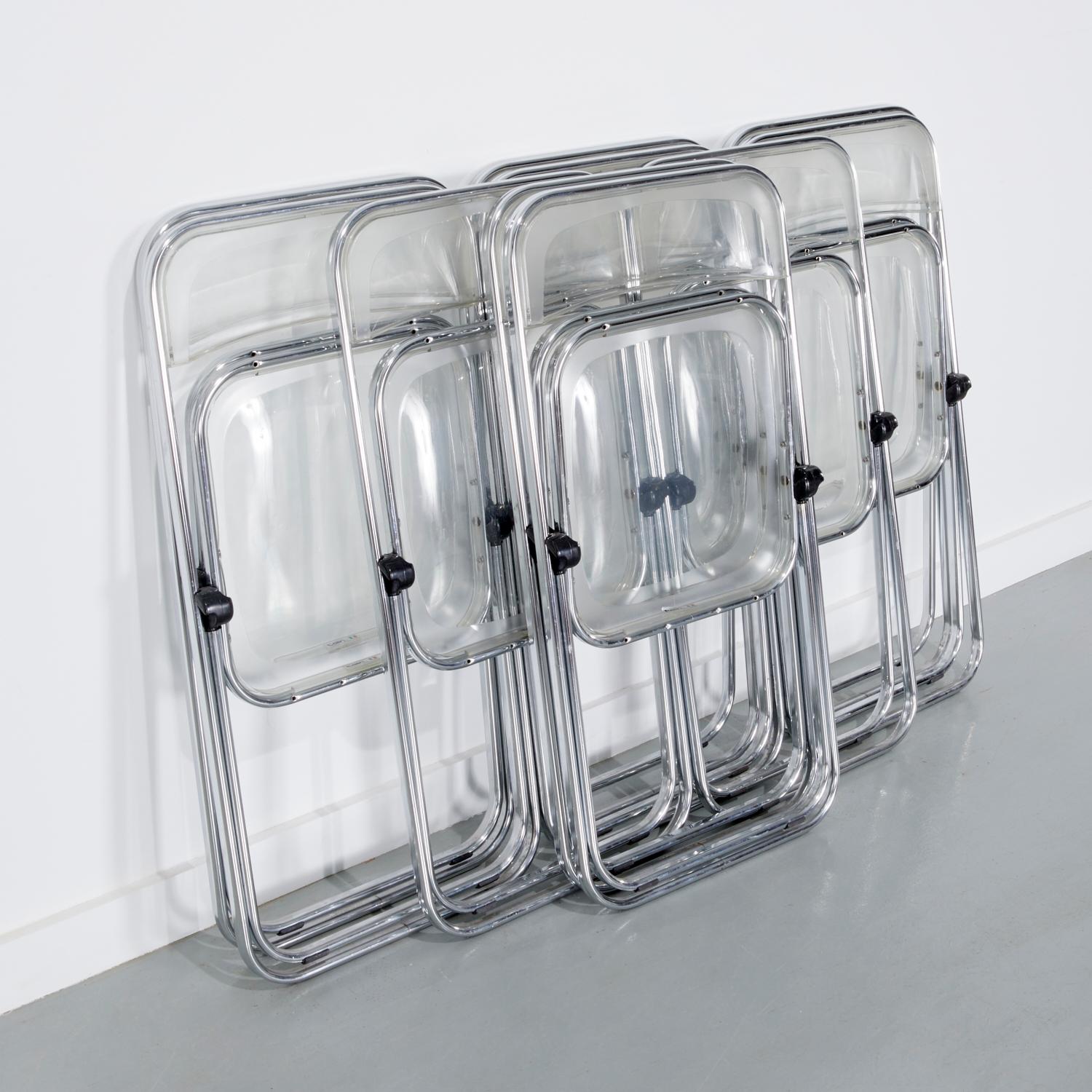 20th century, Italy, a set of ten (10) chrome and acrylic folding chairs with Talin sticker label. In addition to folding, these chairs can be stacked for ease of storage. The chair design is both slim and sleek and is certainly a stylish option