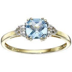 10 Karat Gold Blue Topaz Cushion with Diamond December Birthstone Ring