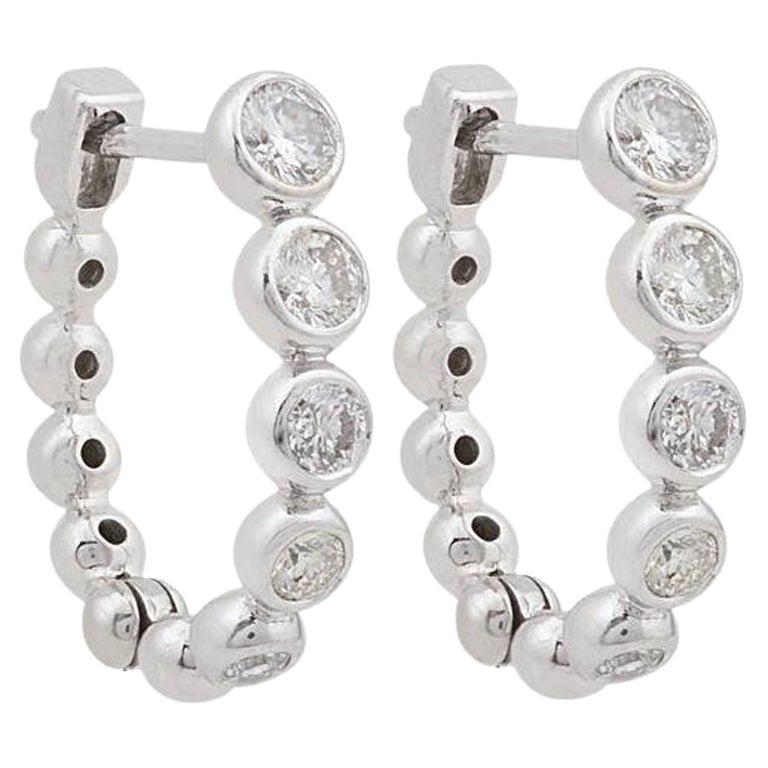 Boucles d'oreilles créoles huggies en or 10 carats et diamant