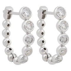 Boucles d'oreilles créoles huggies en or 10 carats et diamant
