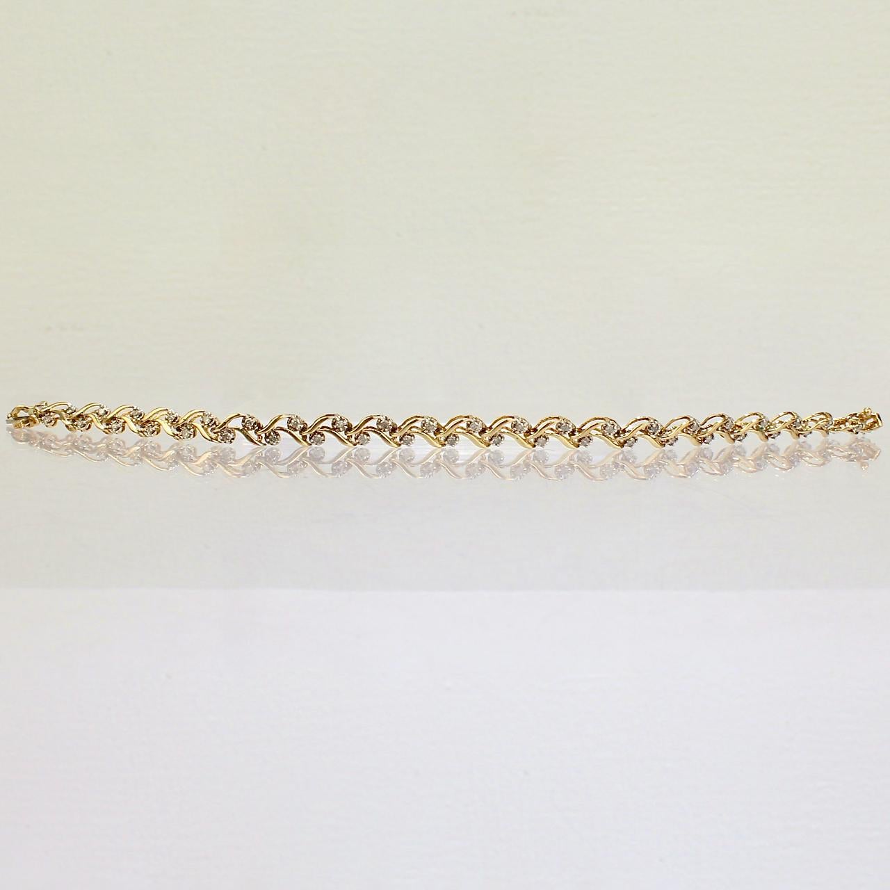 Modern 10 Karat Gold and Diamond Tennis Bracelet