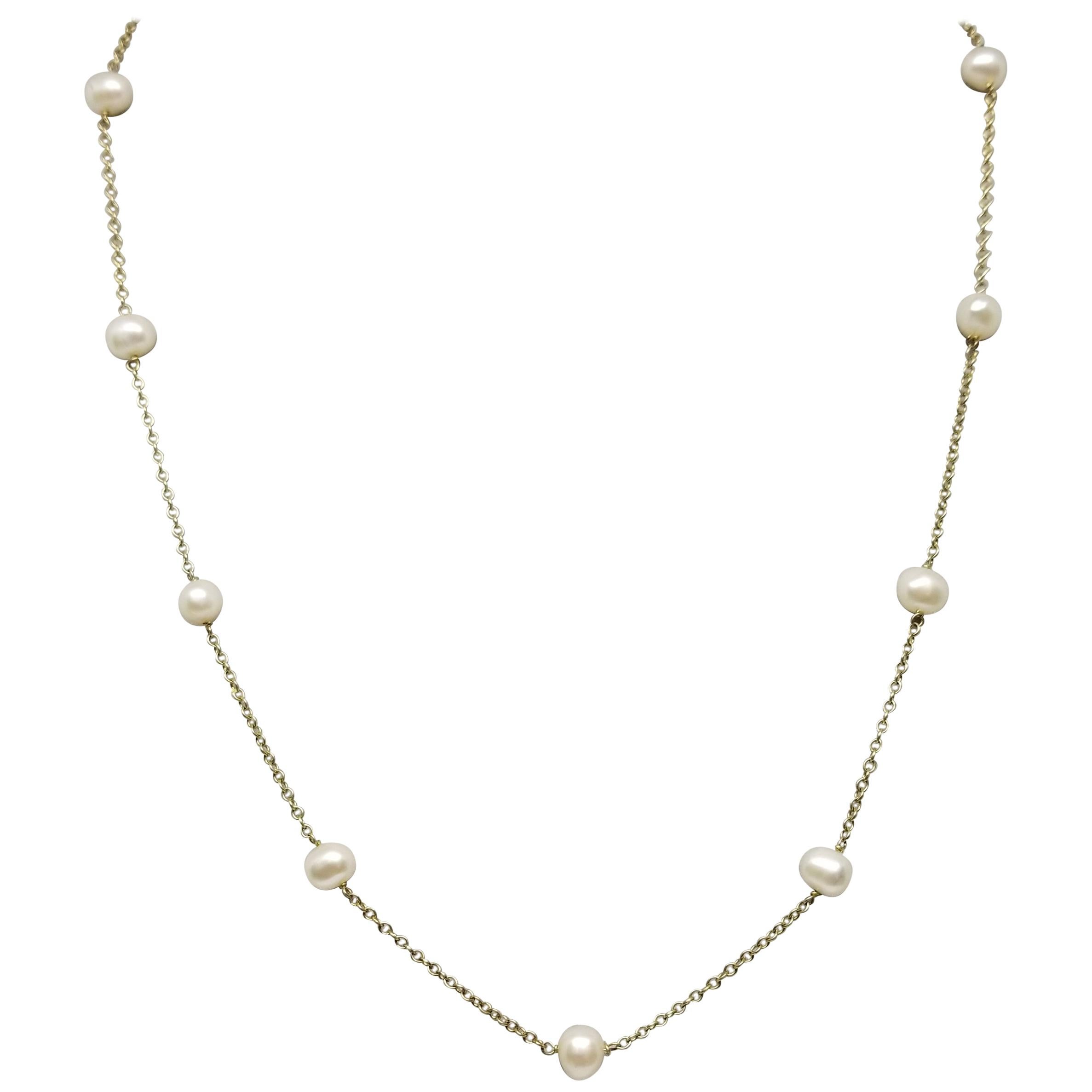 Collier "perle et chaîne" 10 carats en vente