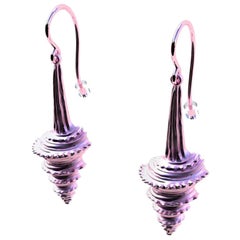 Longues boucles d'oreilles pendantes en or rose 10 carats avec turris en forme de coquille