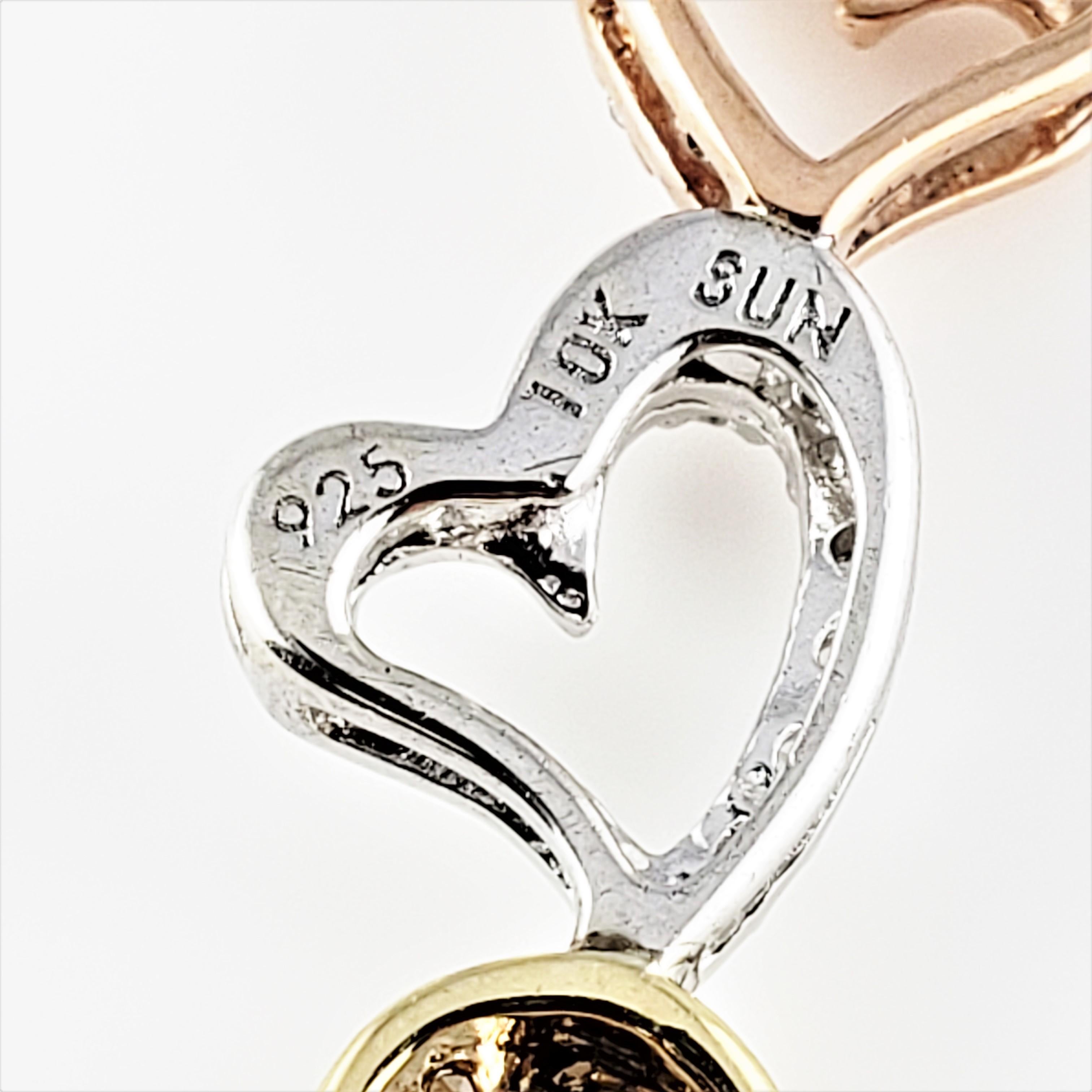 10 Karat Rose and Yellow Gold, Sterling Silver and Diamond Heart Pendant In Good Condition For Sale In Washington Depot, CT