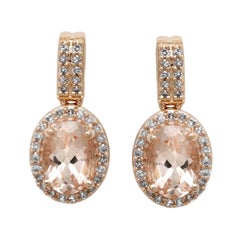 10 Karat Rose Gold Morganite Oval with White Diamonds Dangle Earrings, 1/5 Carat