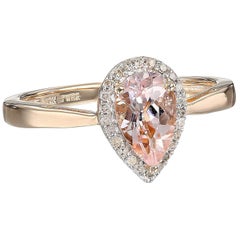 10 Karat Rose Gold Morganite Pear with Diamond Halo Ring
