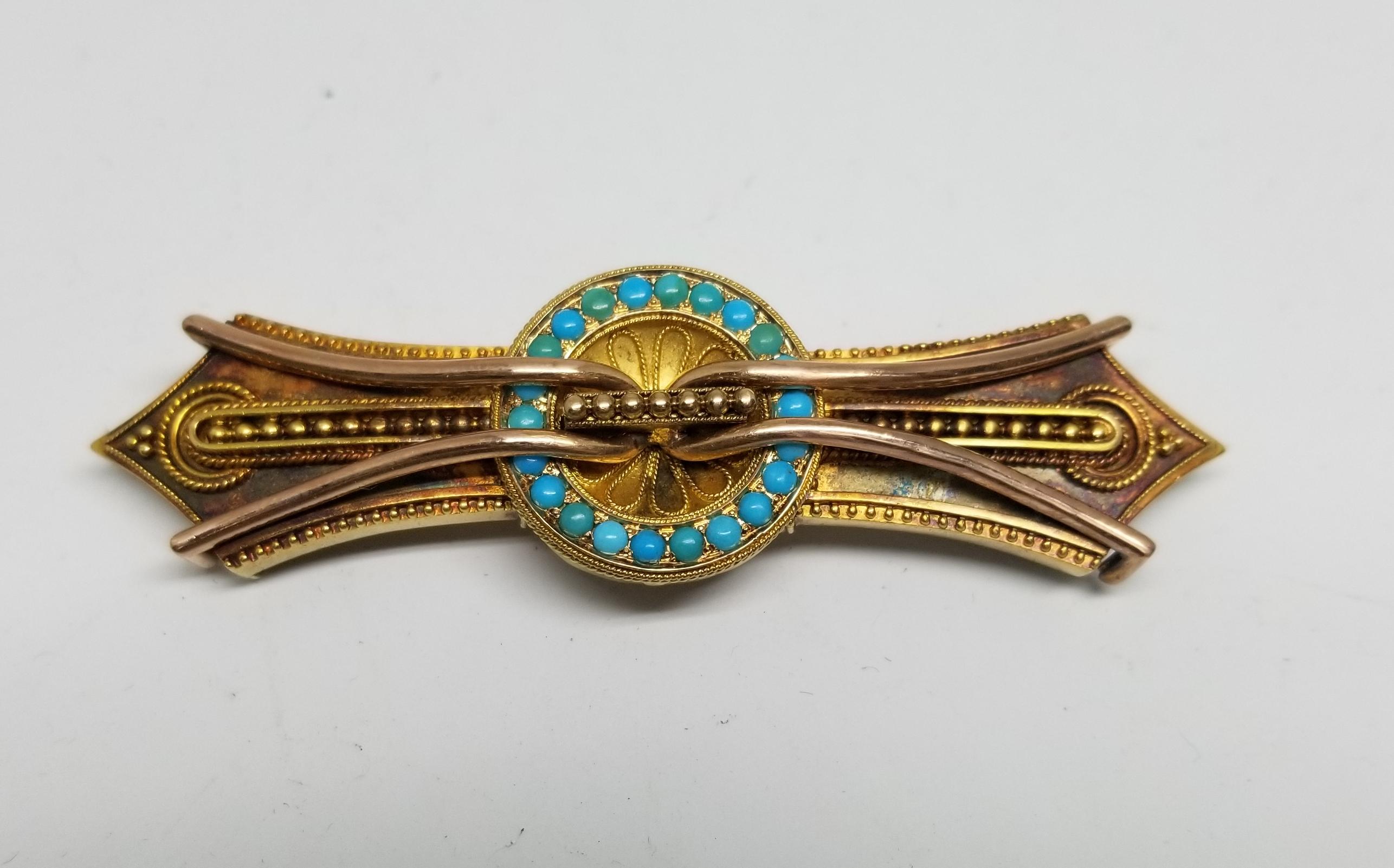 10 karat yellow and rose Turquoise vintage byzantine style brooch, with 22 round turquoise, the brooch has a loop in the back that could be worn as a pendant.