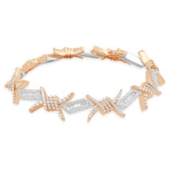 Pulsera de alambre de púas con diamantes redondos y baguette en dos tonos de 10 quilates
