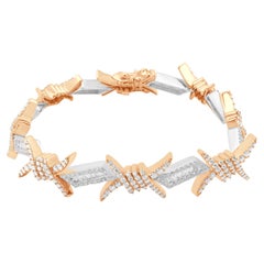 Pulsera de alambre de púas con diamantes redondos y baguette en dos tonos de 10 quilates