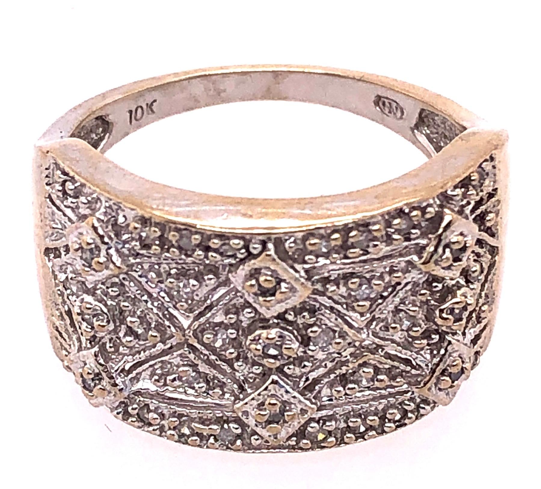 10 Karat Two Tone Yellow And White Gold With Diamond Accents Fashion Ring Band
Size 7
4.17 grams total weight.
