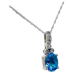 10 Karat White Gold 1.35 Carat Total Weight Blue Topaz and Diamond Necklace