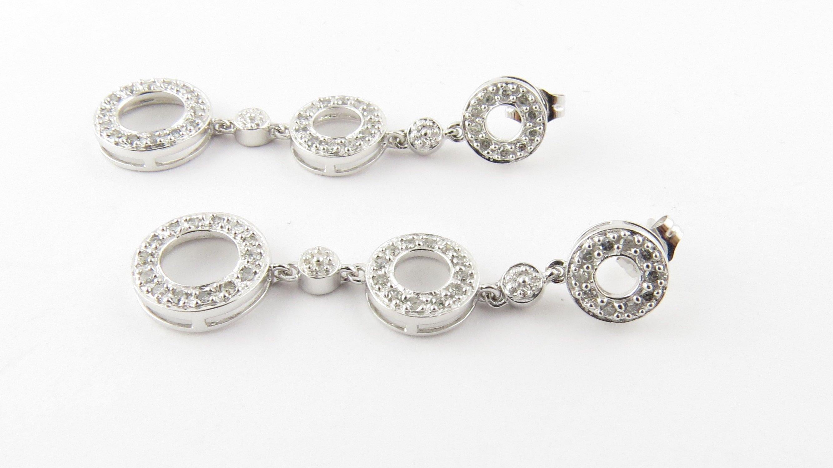 Vintage 10 Karat White Gold and Diamond Earrings- These lovely dangling earrings each feature 36 round single cut diamonds set in classic 10K white gold. Push back closures. Approximate total diamond weight: .72 ct. Diamond color: I-J Diamond
