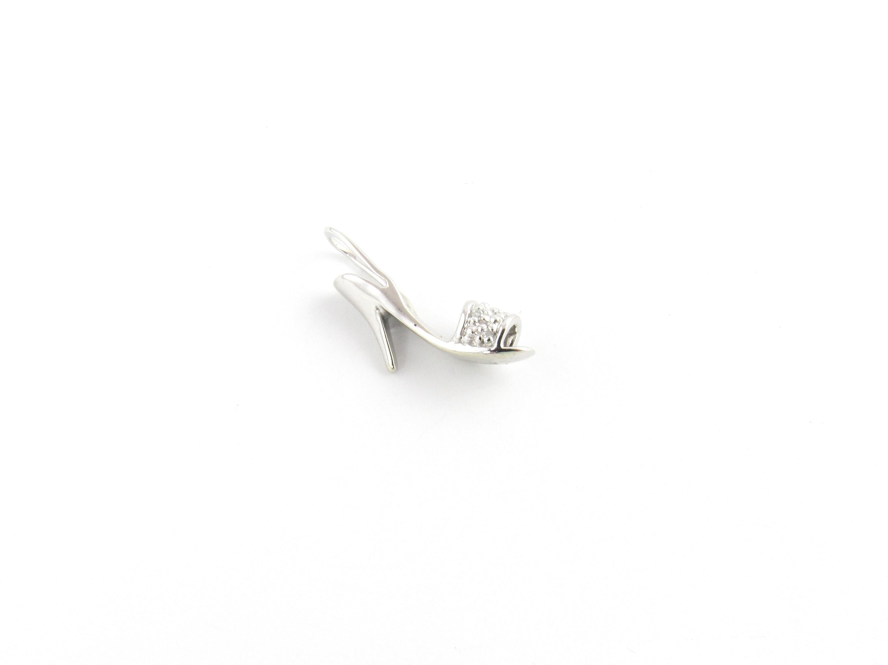 Vintage 10 Karat White Gold and Diamond High-Heeled Sandal Charm-

Time to put your dancing shoes on!

This lovely 3D charm features a miniature high-heeled sandal accented with six round single cut diamonds set in classic 10K white