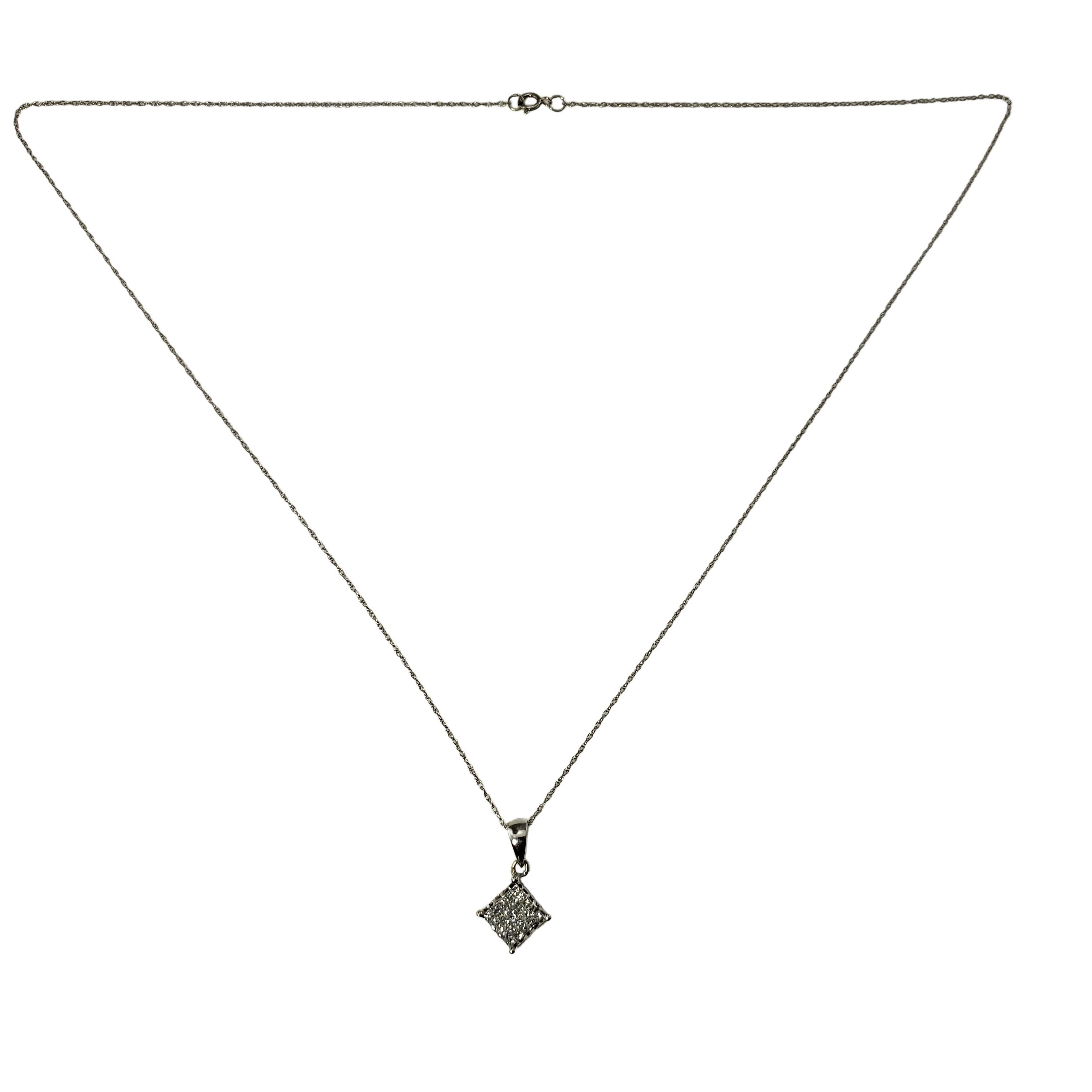 10 Karat White Gold Diamond Pendant Necklace-

This sparkling pendant necklace features 25 princess cut diamonds set in classic 10K white gold.

Approximate total diamond weight:  .25 ct.

Diamond color: H

Diamond clarity: SI1

Size: 17.5 inches