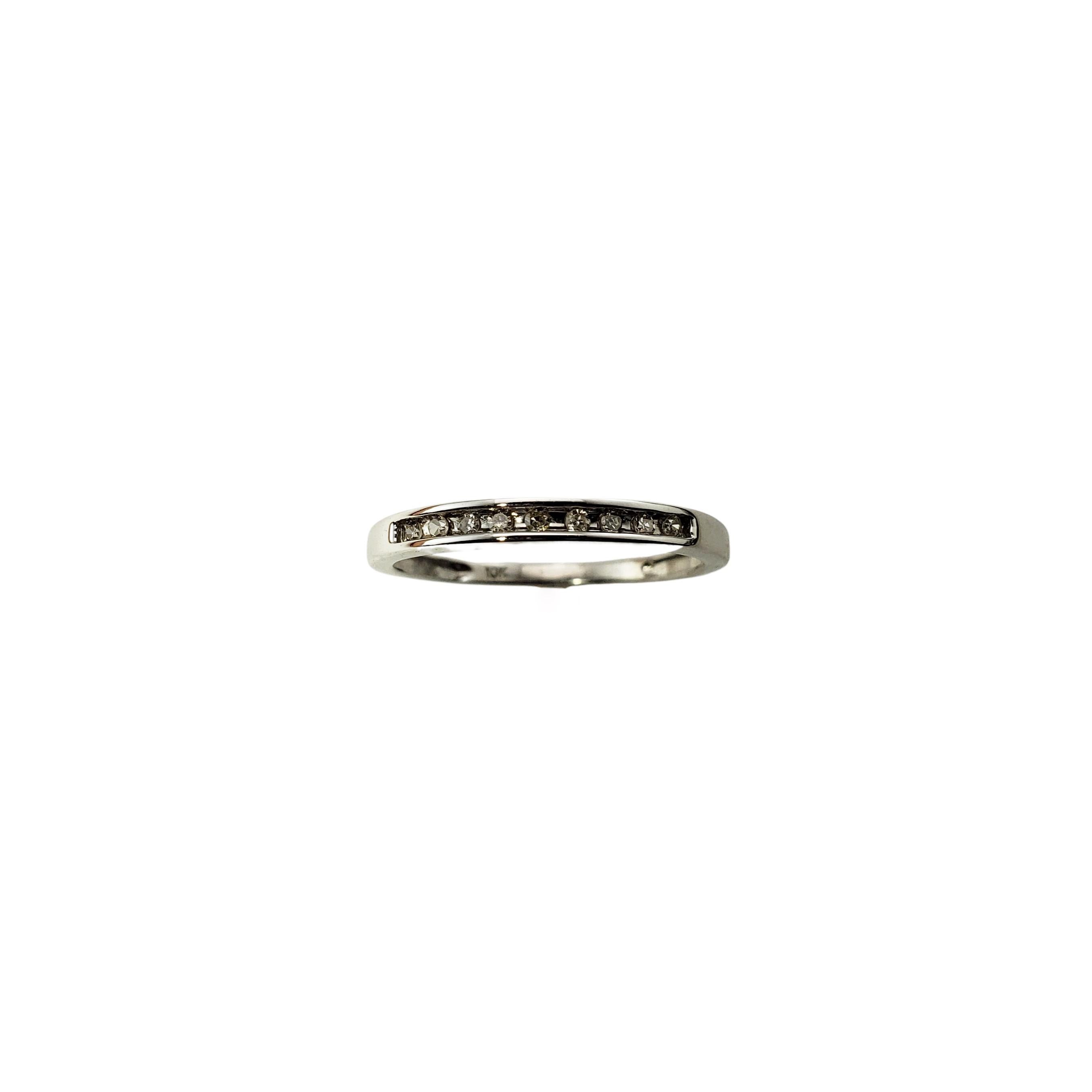 10 Karat White Gold and Diamond Wedding Band Ring Size 8-

This sparkling band features nine round single cut diamonds set in classic 10K white gold.  Width:  3 mm.  Shank:  2 mm.

Approximate total diamond weight:  .09 ct.

Diamond color: