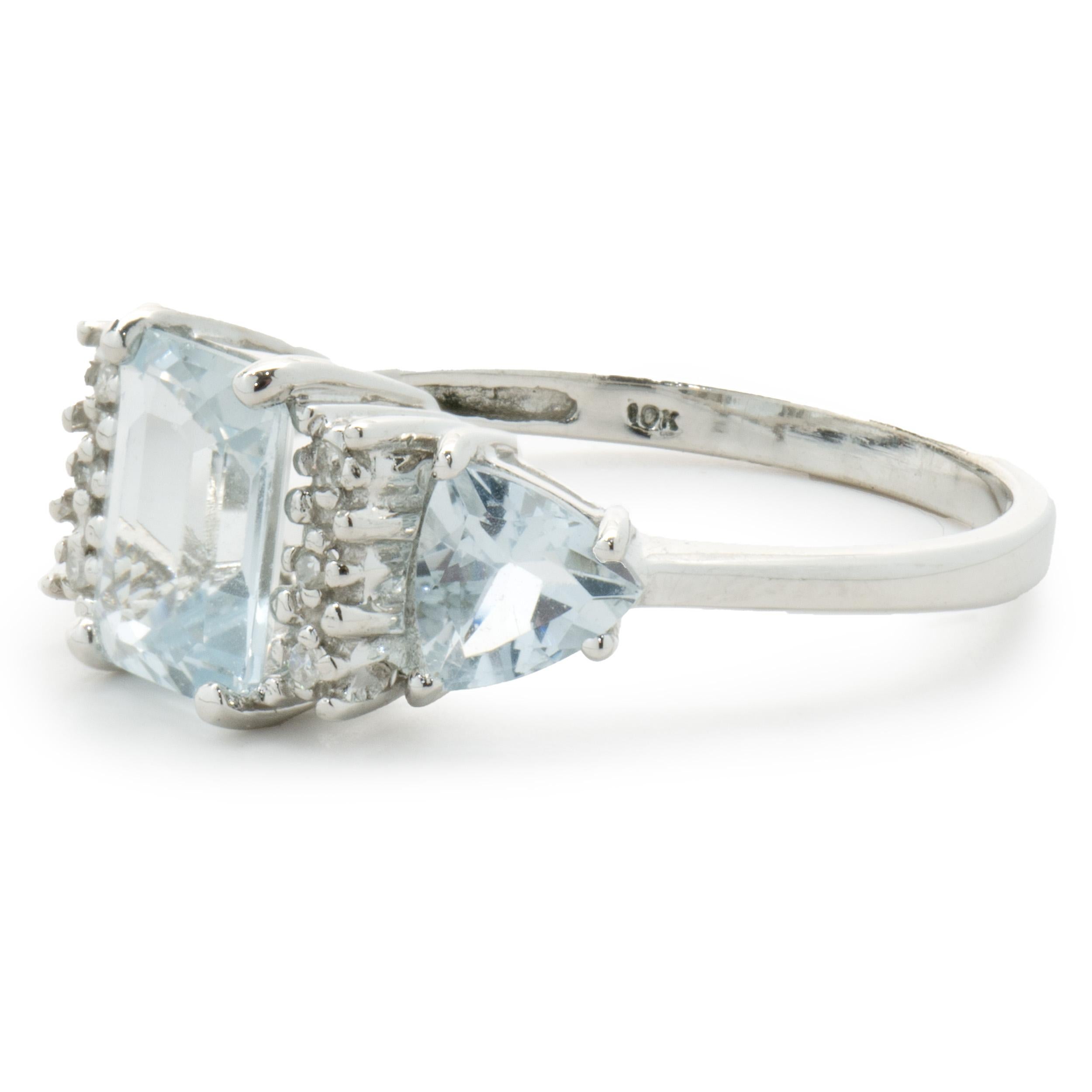 Designer: custom design
Material: 10K white gold
Diamond: 6 single round cut = 0.03cttw
Color: G
Clarity: SI1-2
Aquamarine: 2.10cttw
Dimensions: ring top measures 8.64mm wide
Ring Size: 7 (please allow two extra shipping days for sizing requests)