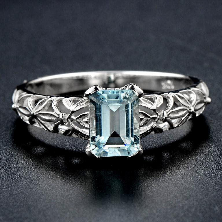 Filigree Style Ring set with Step Cut Aquamarine 0.9 Carat 10 Karat White Gold. 

This Ring was made in size US#7


