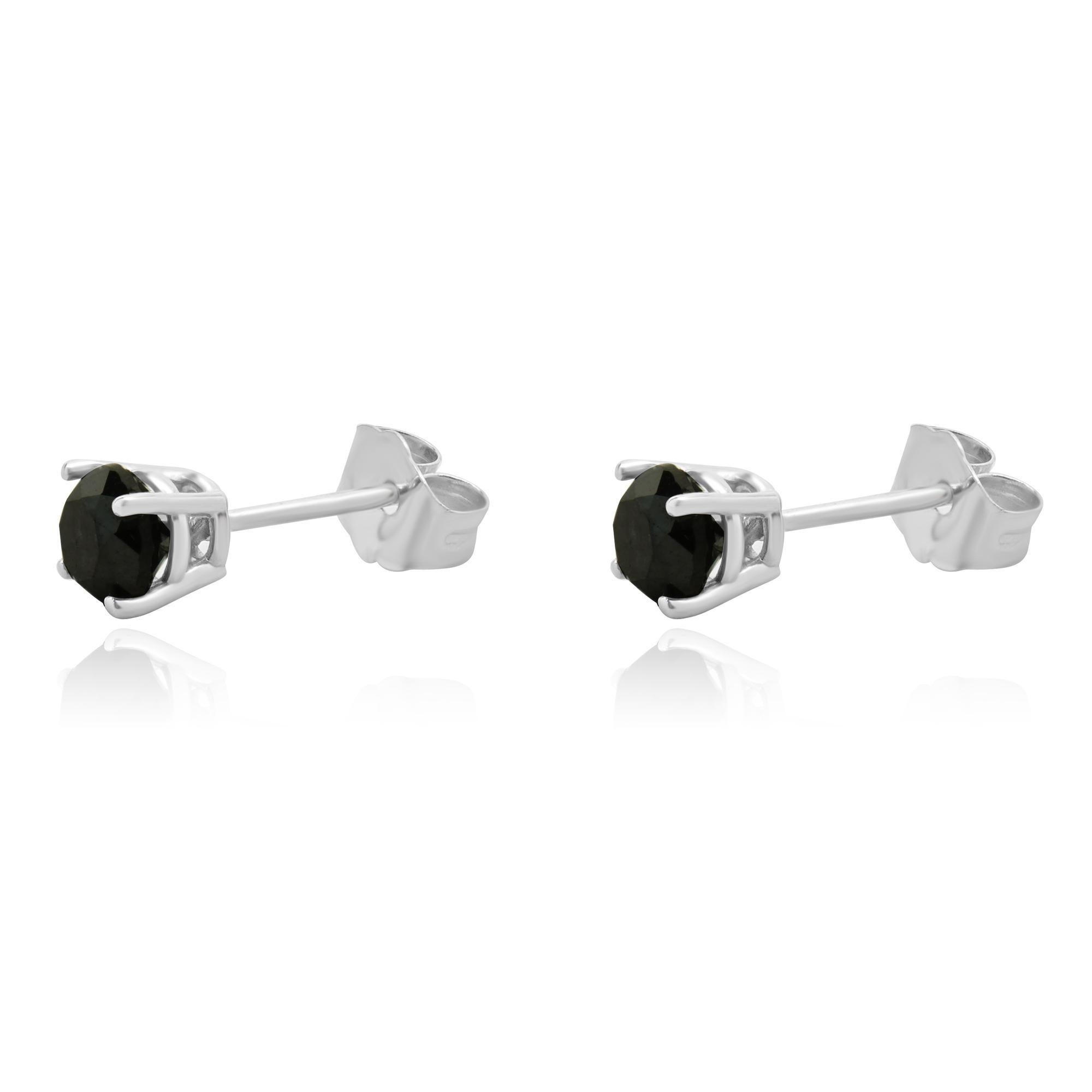Material: 10K white gold
Diamonds: 2 round brilliant cut = 0.60cttw
Color: Black
Clarity: SI2
Dimensions: earrings measure approximately 6mm in diameter
Fastenings: friction backs
Weight: 0.69 grams