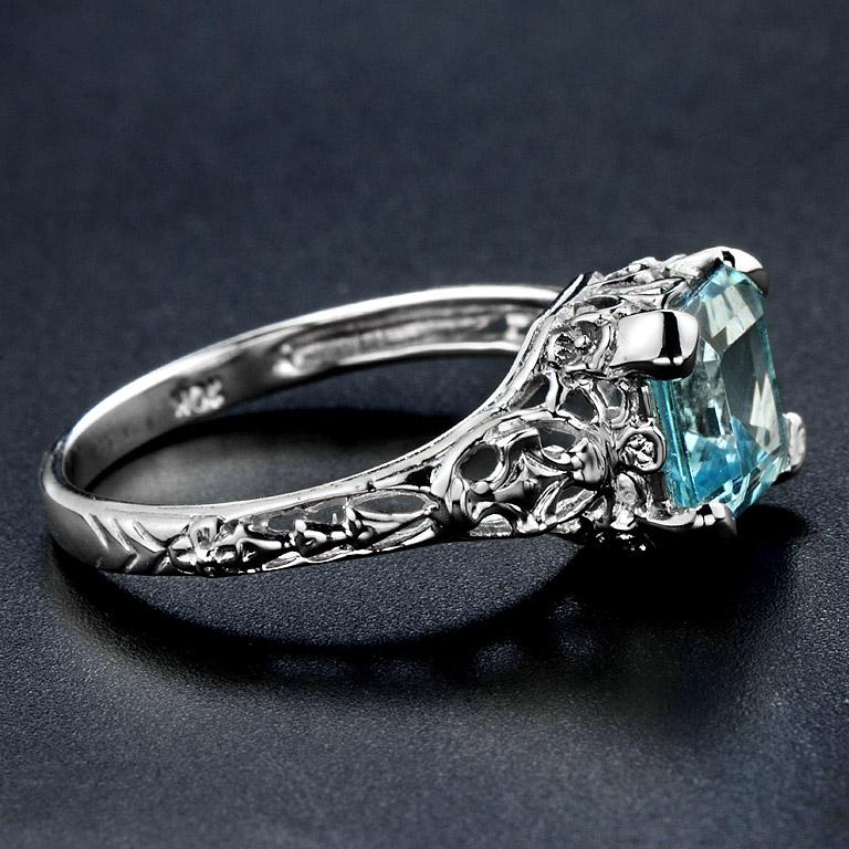 Emerald Cut 10 Karat White Gold Blue Topaz Filigree Ring