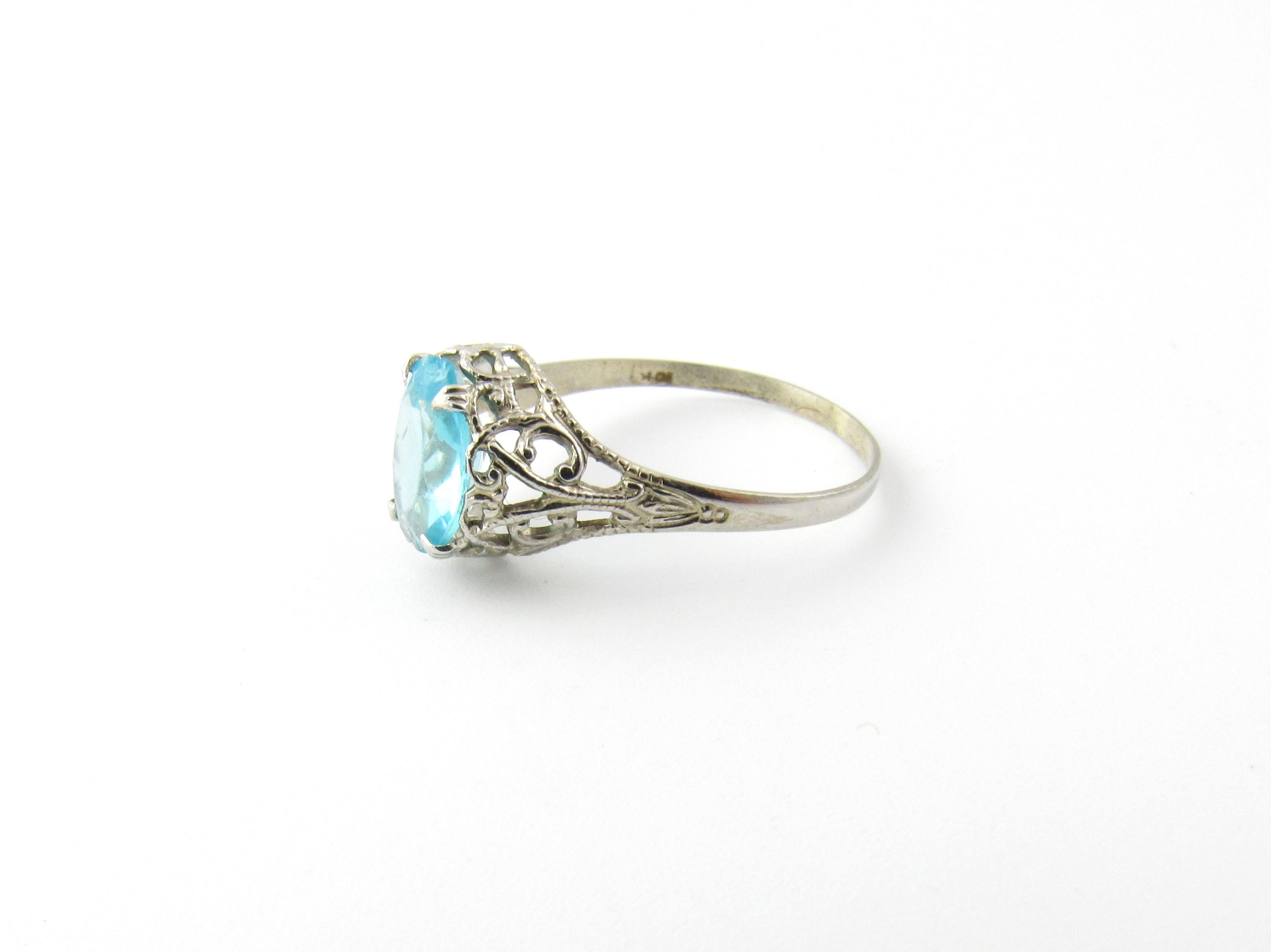 Vintage 10 Karat White Gold Blue Topaz Ring Size 7.5

This stunning ring features one oval blue topaz (9 mm x 7 mm) set in beautifully detailed 10K white gold filigree. Shank measures 1.5 . Height measures 5 mm.

Ring Size: 7.5

Weight: 0.8 dwt. /