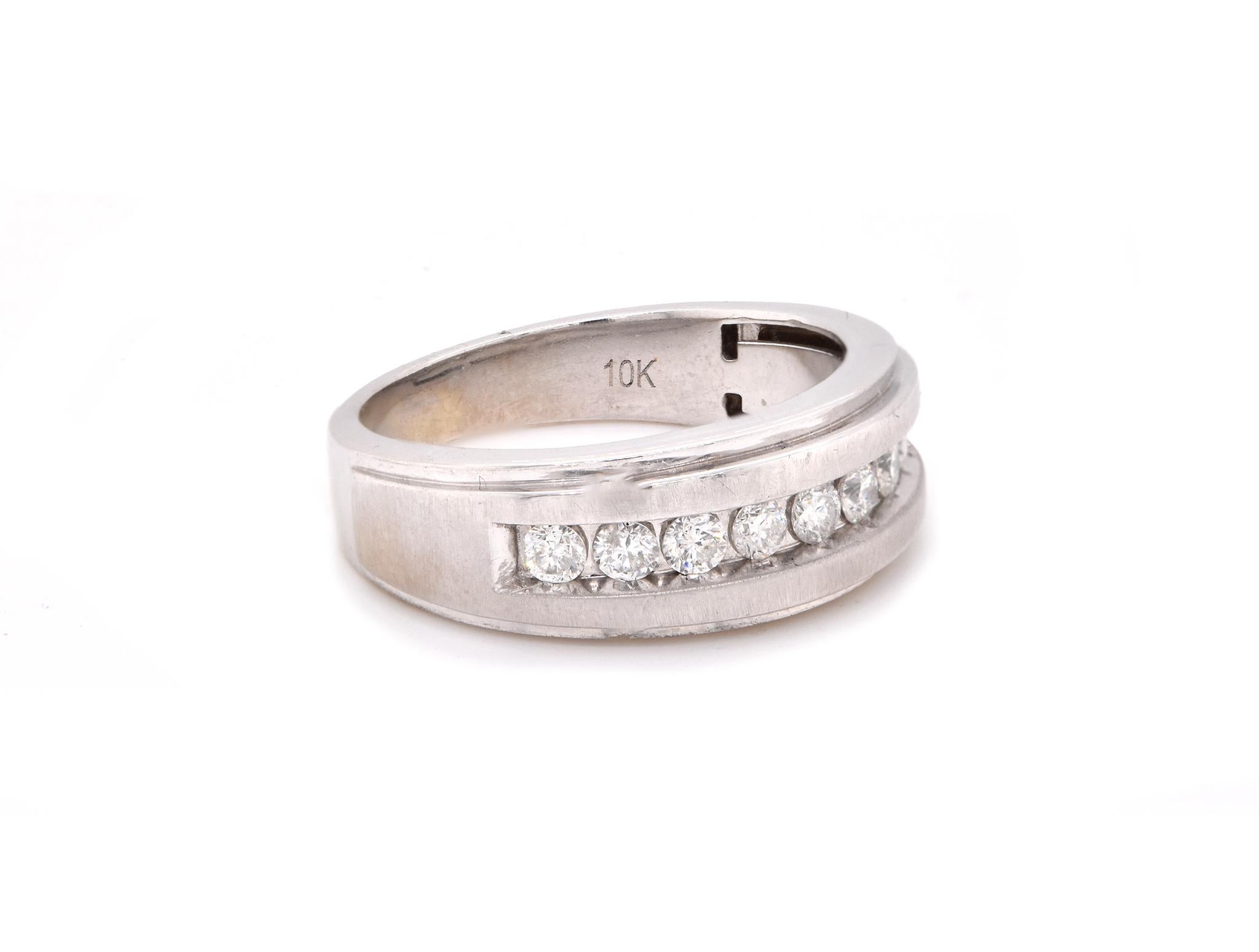 Designer: custom designed 
Material: 10K white gold
Diamonds: 9 round cut = .50cttw
Color: H
Clarity: SI2
Size: 9 (please allow two additional shipping days for sizing requests)
Dimensions: top measures 7.8mm wide
Weight: 5.9 grams
