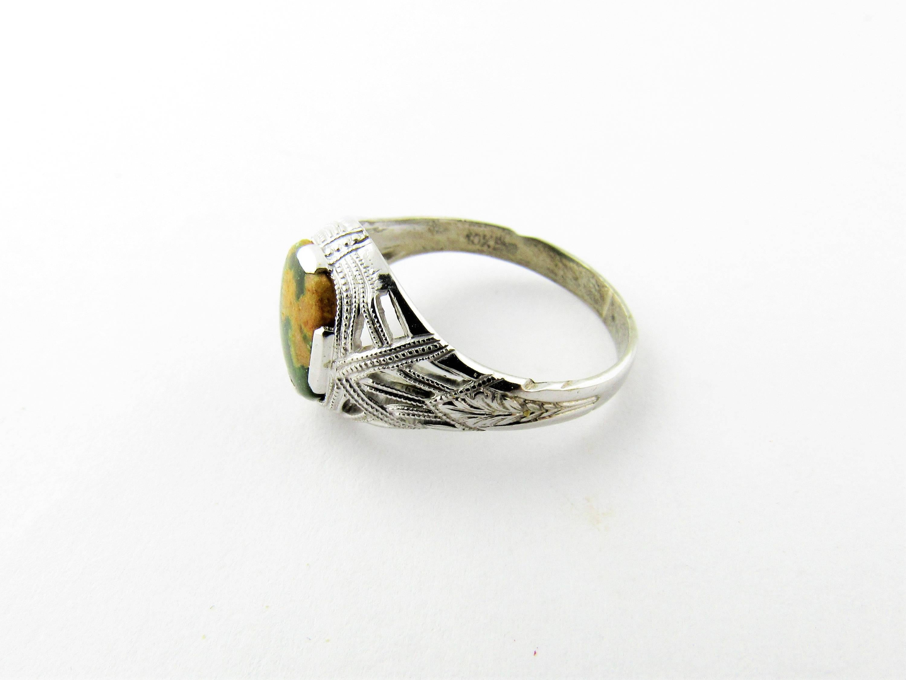 Vintage 10K White Gold Connemara Green Marbleized Stone Ring Size 6.5 2.1 g 1.3 dwt marked 10K inside the band Front of ring is 11mm by 10mm Back of band is 12.5 mm Excellent pre owned condition All of our items are packaged securely and shipped