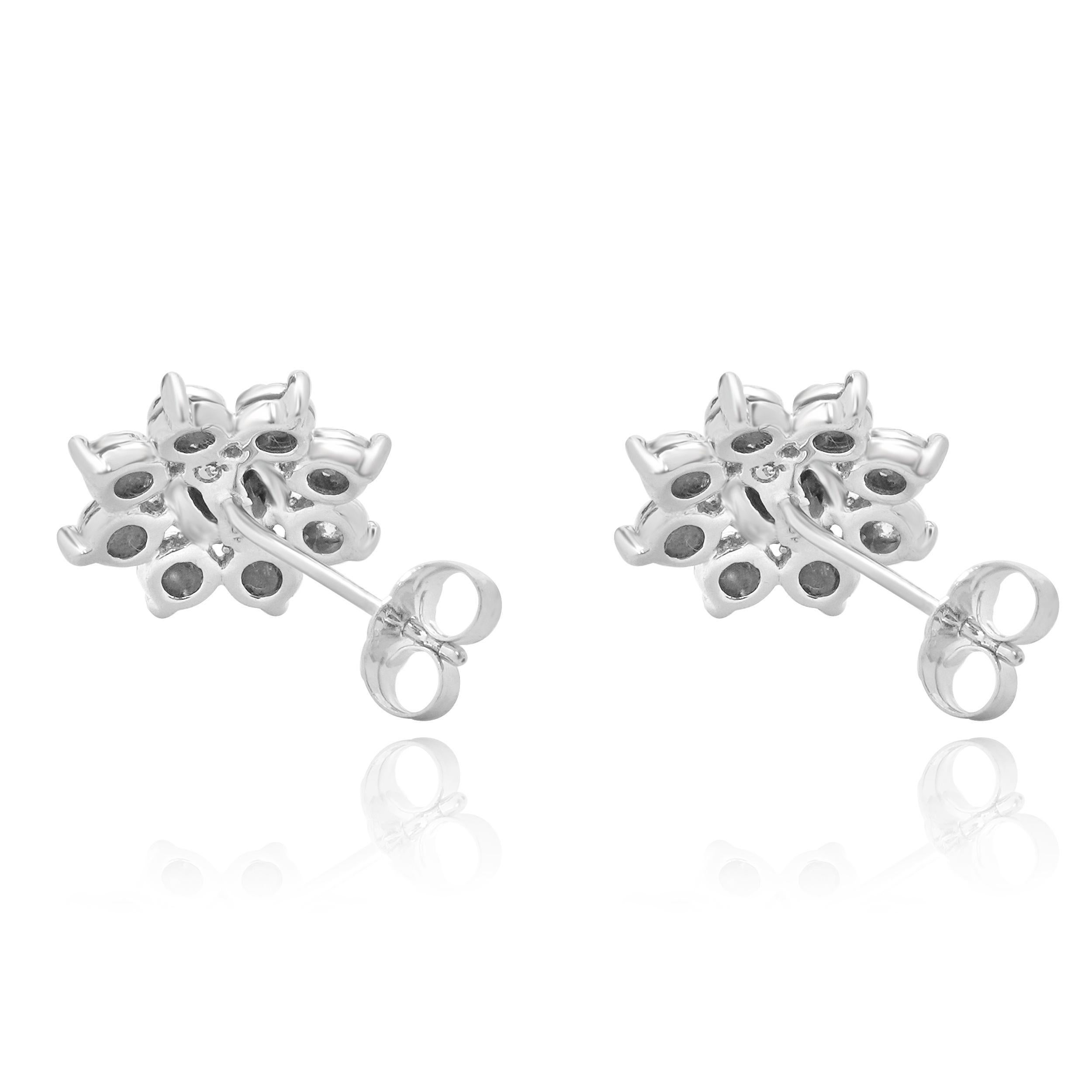 Material: 10K white gold
Diamonds: round brilliant cut = 0.45cttw
Color: I / J 
Clarity: I2
Dimensions: earrings measure approximately 12.80mm in diameter
Fastenings: friction backs
Weight: 2.78 grams

155-387