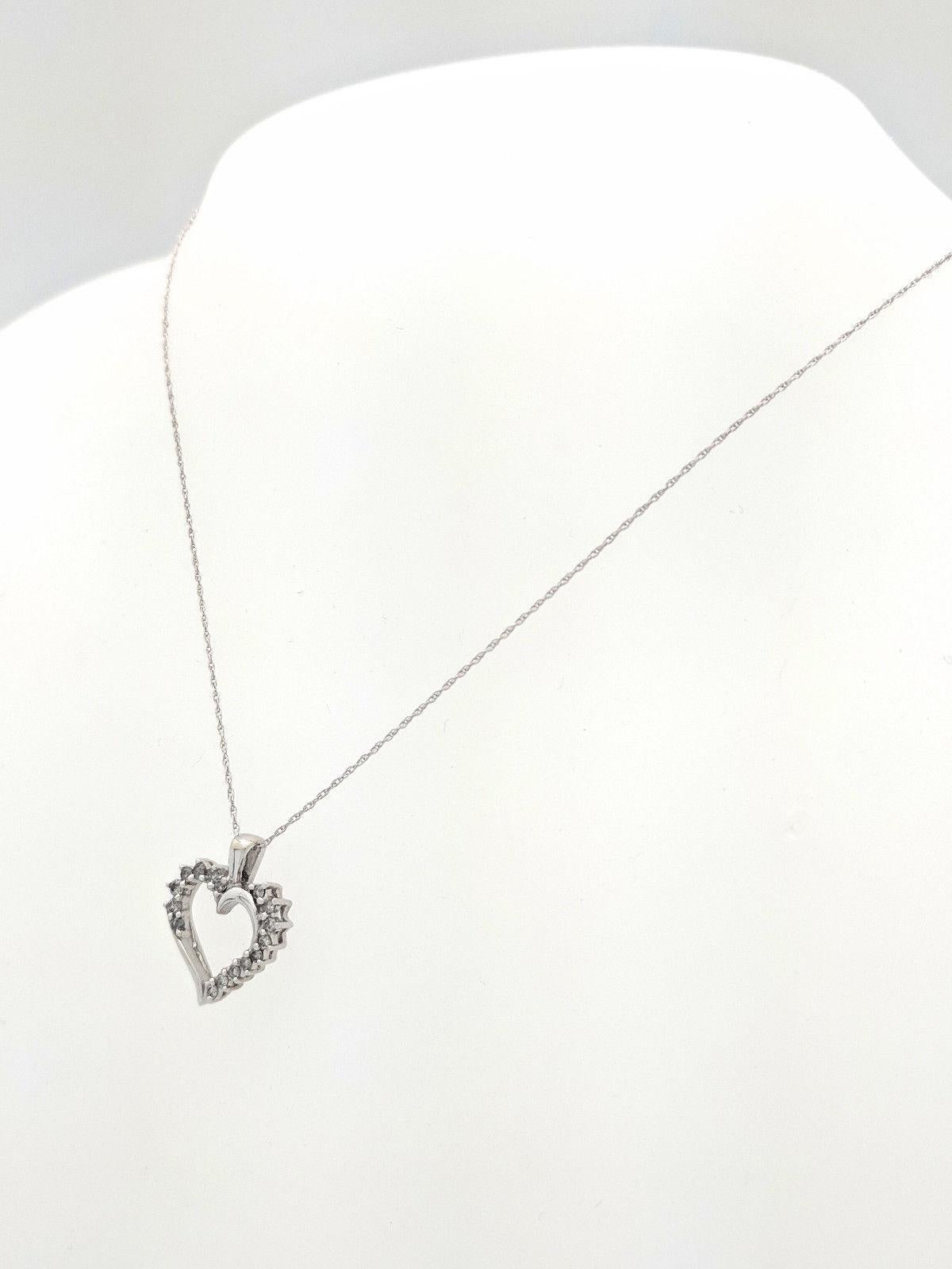 Round Cut 10 Karat White Gold Diamond Heart Pendant Necklace For Sale