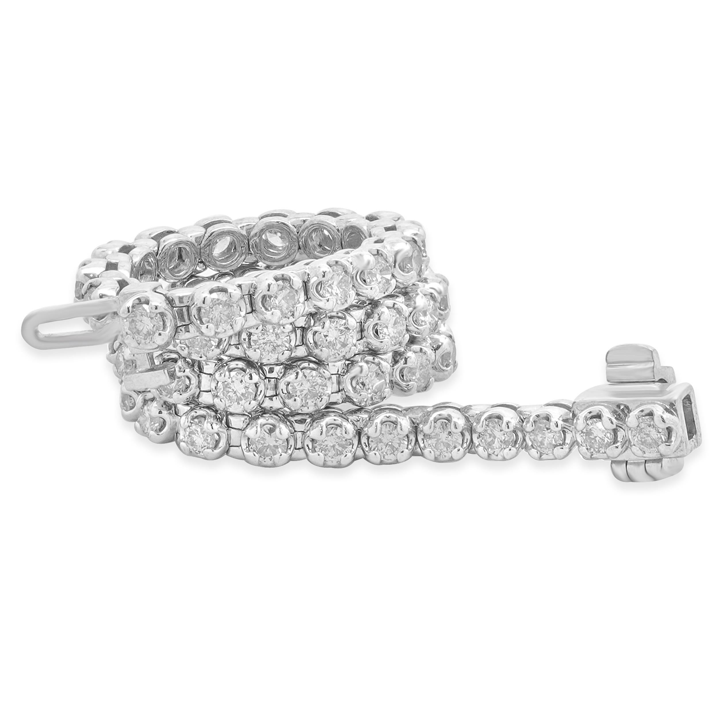 Diseñador: custom
Material: Oro blanco de 10 quilates
Diamante: 54 talla brillante redonda = 2,16cttw
Color: K
Claridad: SI3
Dimensiones: la pulsera se ajusta a una muñeca de hasta 7.25 pulgadas
Peso: 12,30 gramos
