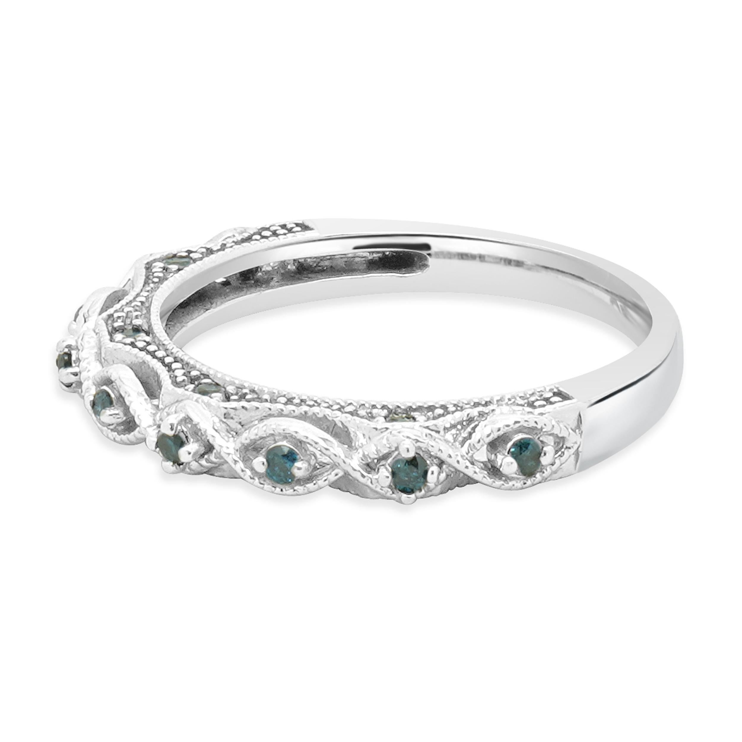 Designer: custom
Material: 10K white gold
Diamond: 17 round brilliant cut = 0.17cttw
Color: Irradiated Blue
Clarity: I2
Ring size: 5.5 (please allow two additional shipping days for sizing requests)
Weight: 2.30 grams
