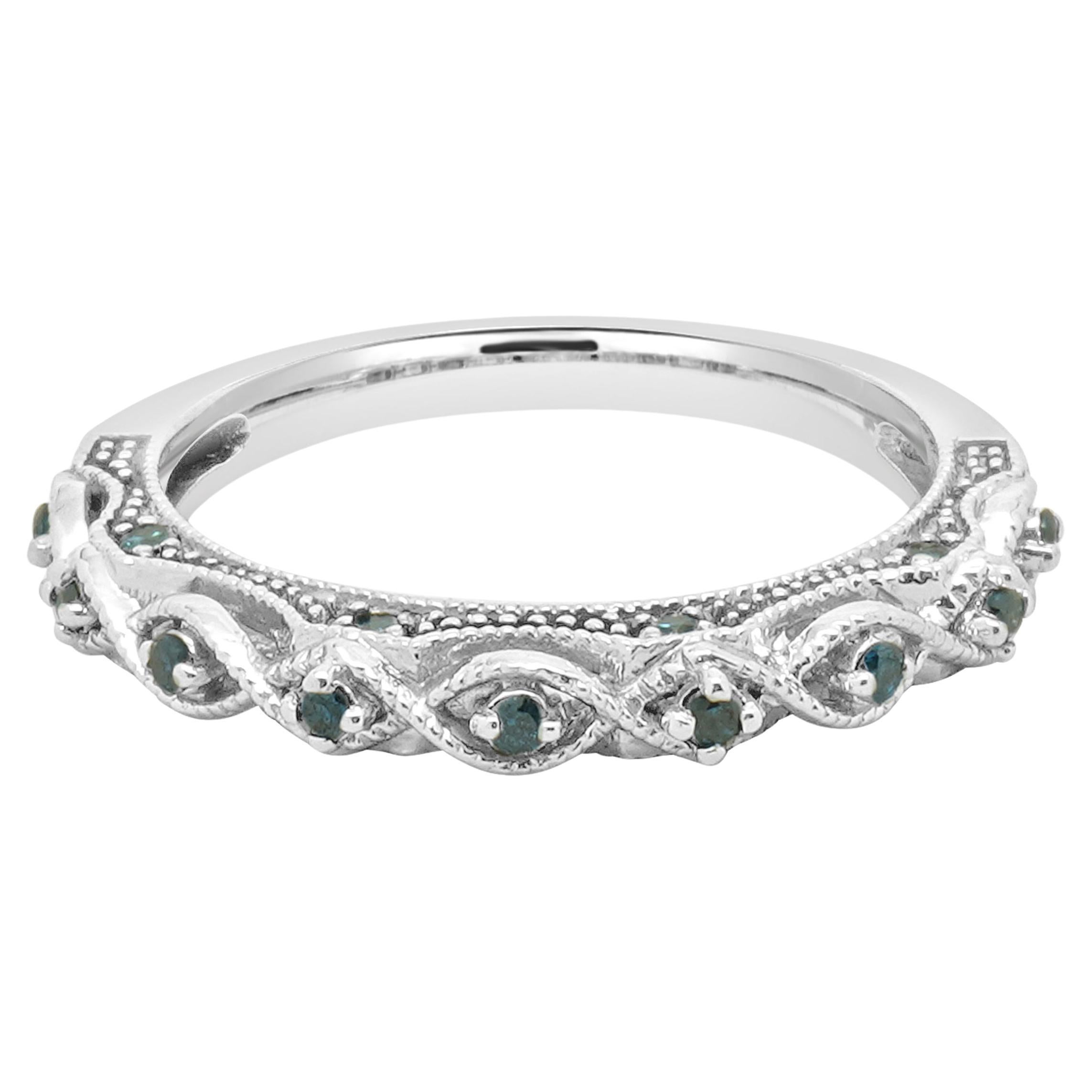 Anillo contorneado de oro blanco de 10 quilates con diamantes azules irradiados