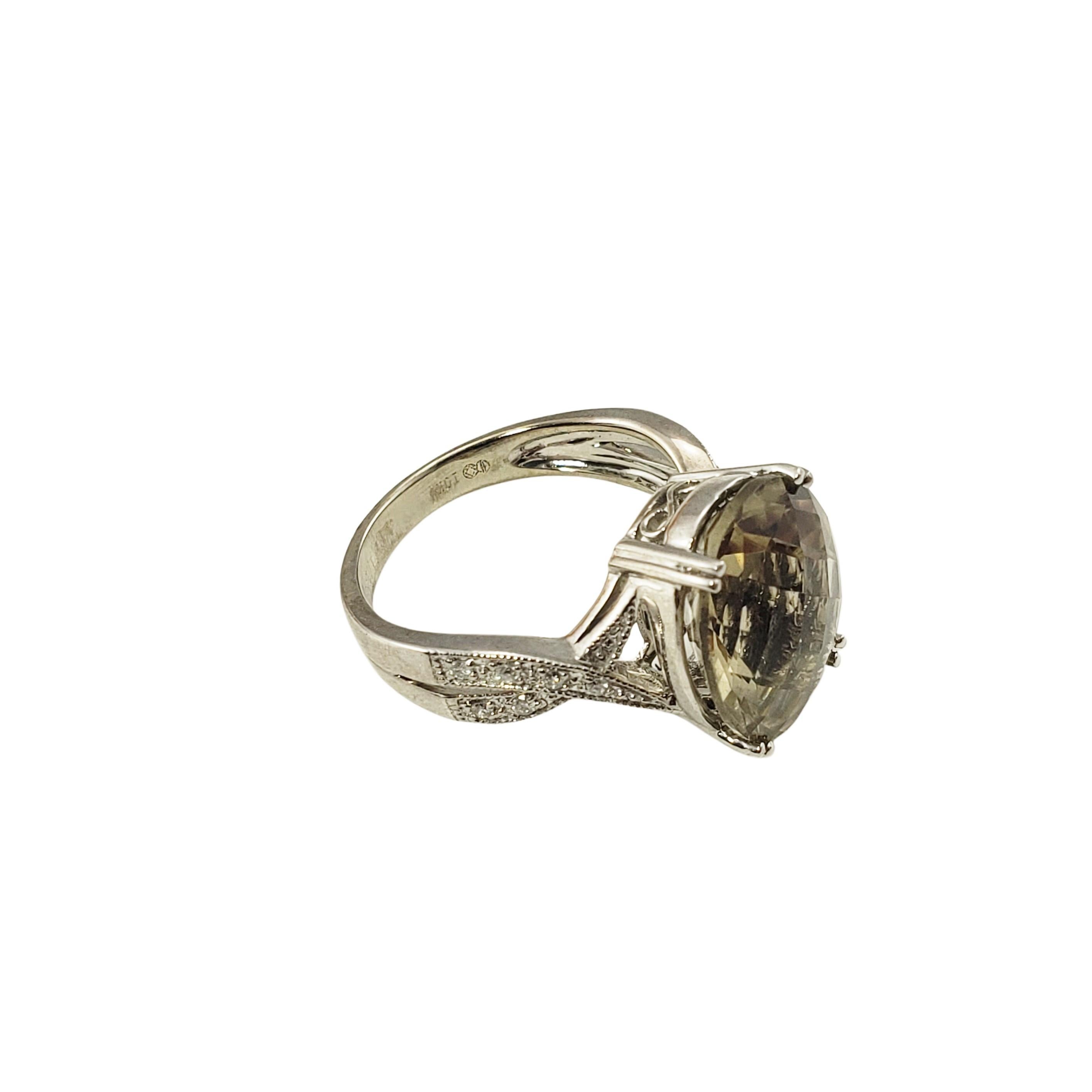 Brilliant Cut 10 Karat White Gold Peridot and Diamond Ring For Sale