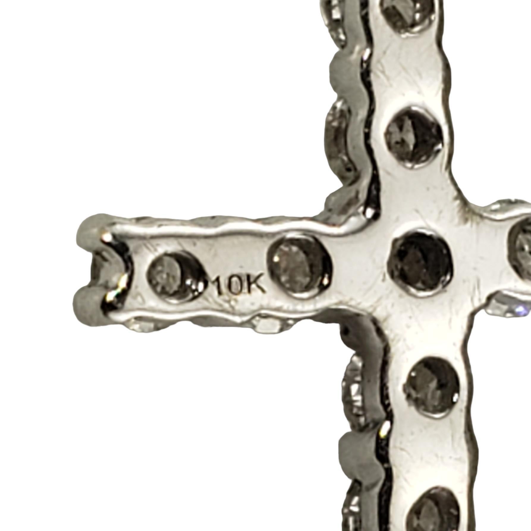 Women's 10 Karat White Gold Petite Diamond Cross Pendant #18065 For Sale