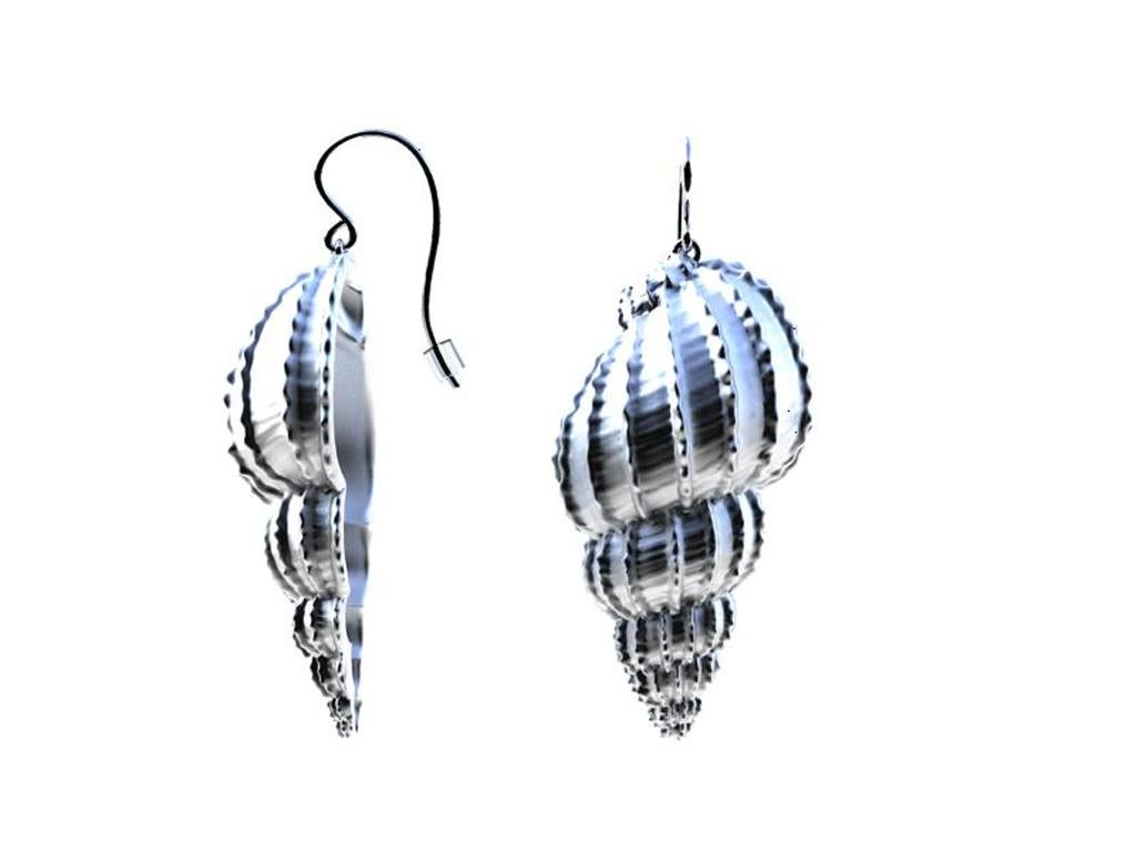 10 karat White Gold Polka Dot Shell Earrings, The Ocean Series ,  In time for the Summer beach nights.  With vertical bumps and dots to accentuate this shell . Tulip shell earrings are ust over 1 inch or   28 x 15 mm . With hook 40mm . { 1.5 inches