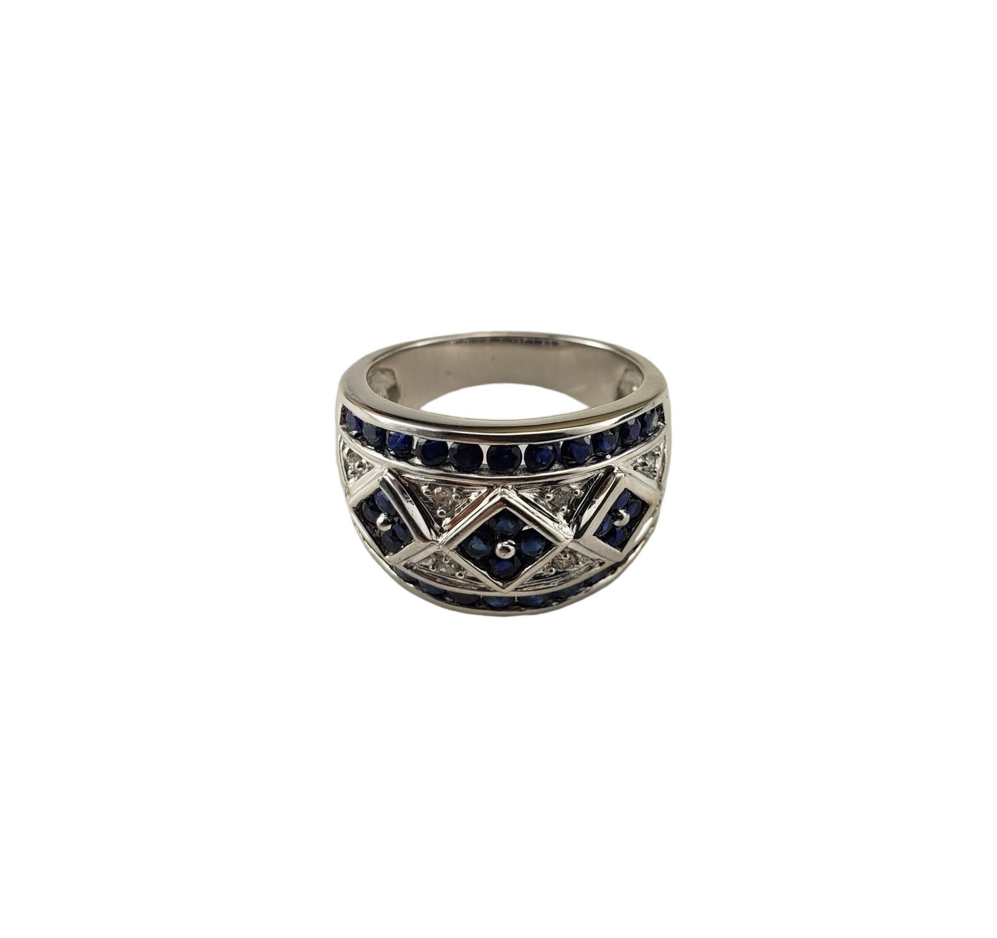 10K White Gold Sapphire and Diamond Band Ring Size 7

This elegant band features 34 round sapphires and eight round single cut diamonds set in classic 10K white gold.  

Width:  13.5 mm.  Shank: 4.5 mm.

Approximate total diamond weight: .08