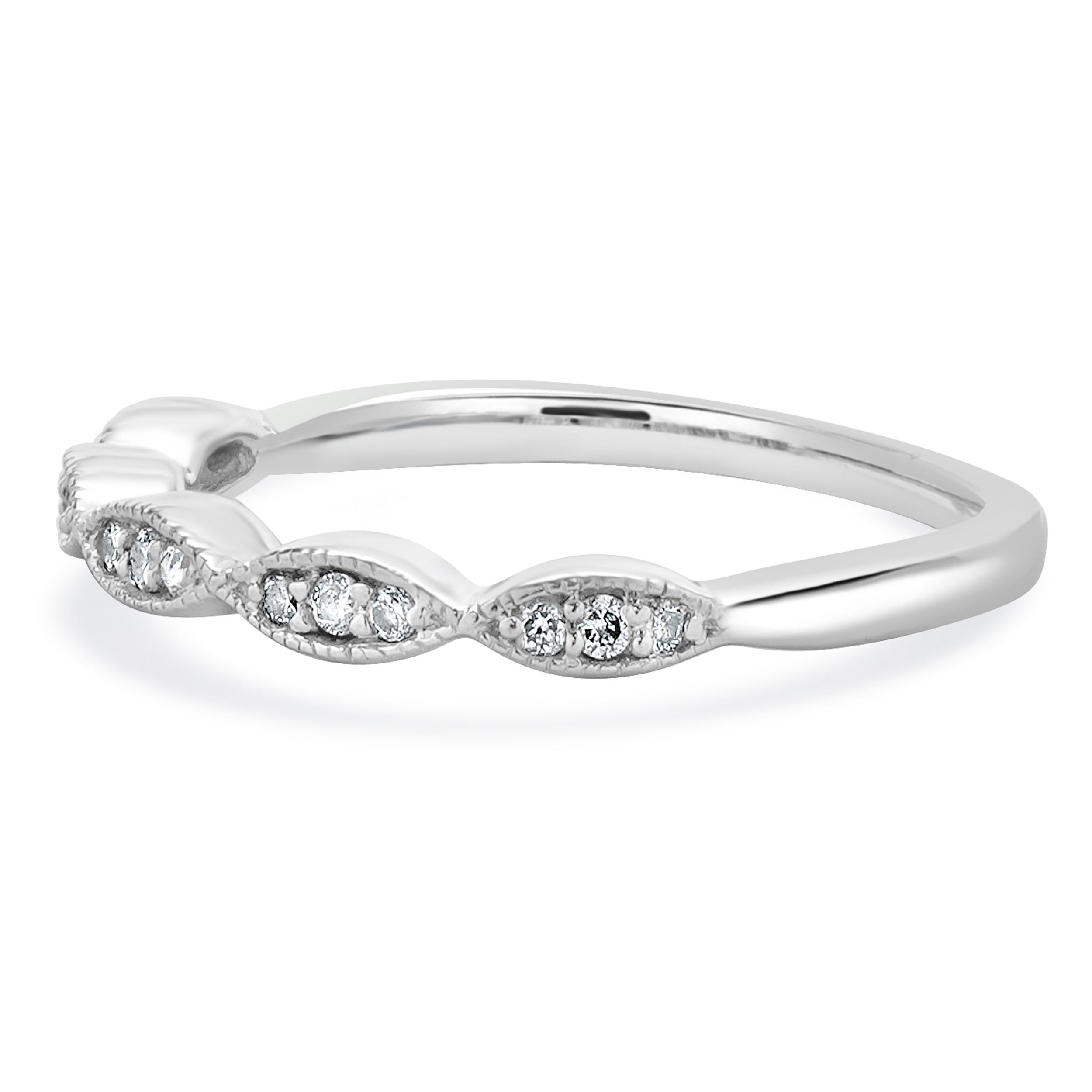 Designer: custom
Material: 10K white gold
Diamond: round brilliant cut = 0.08cttw
Color: I
Clarity: I1
Ring size: 5 (please allow two additional shipping days for sizing requests)
Weight: 1.60 grams
